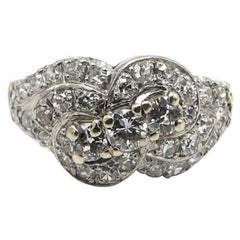 Classic Retro Ribbon Design Diamond and Platinum Ring