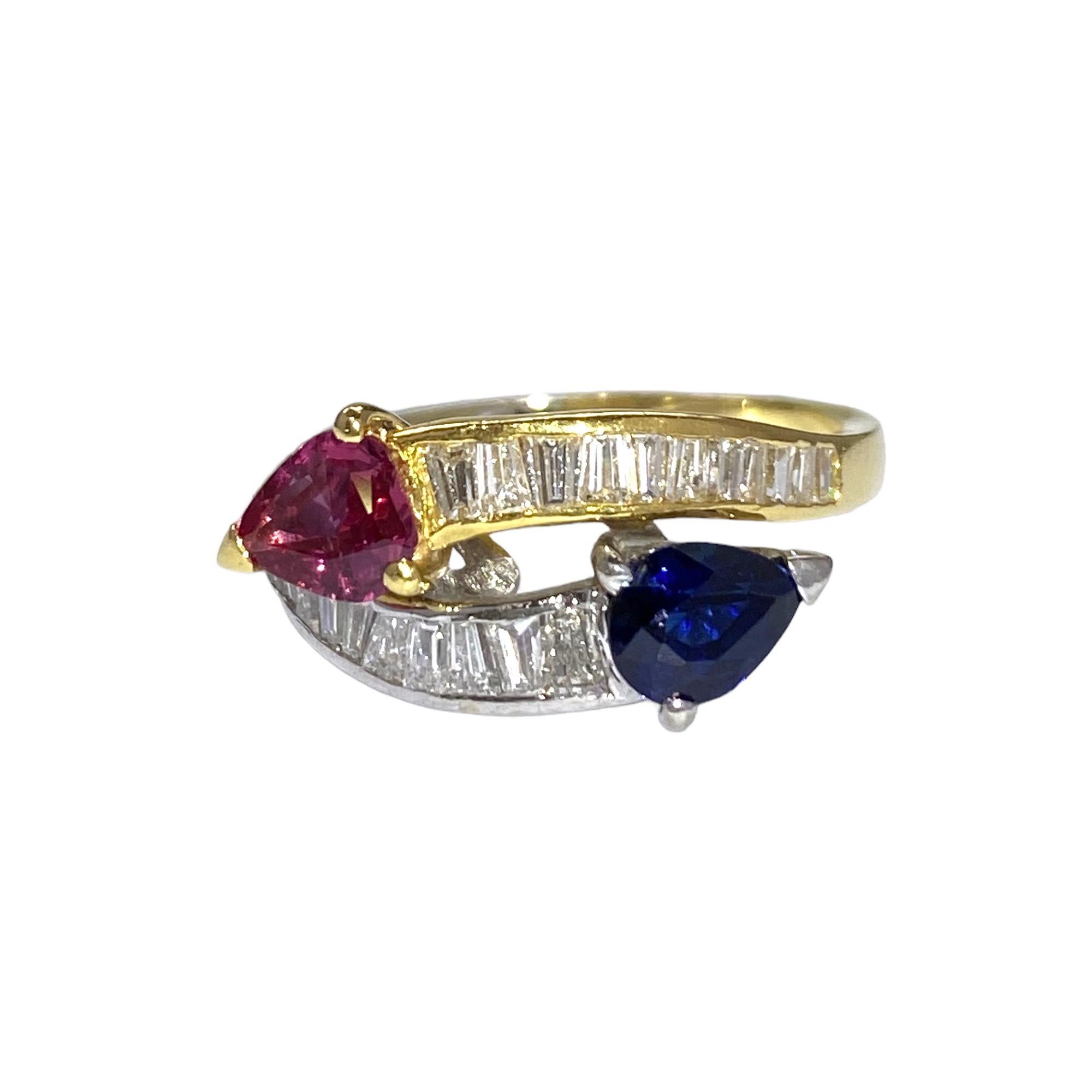 Very Good condition - quality grade of setting and polishing is very good
Total weight: 4,95 grams
Diamonds : 0,80 carats white natural diamonds, baguette cut
Natural Ruby : 0,90 ct - Pear Shape 
Natural Sapphire : 0,90 ct - Pear Shape 
Made in