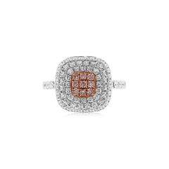 Classic ring with round cut Pink diamonds and white diamonds, made in platinum