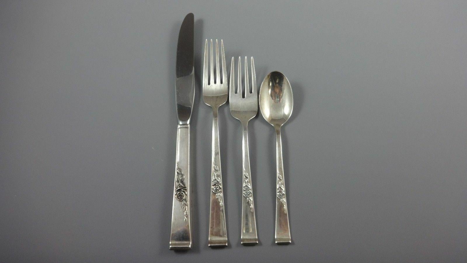 Classic rose by Reed & Barton sterling silver flatware set of 66 pieces. This set includes:

12 knives, 9 1/8