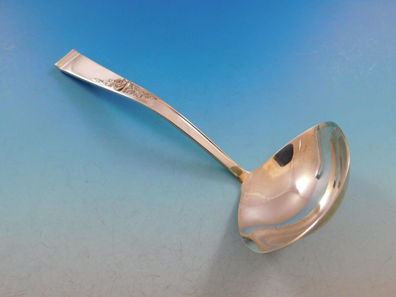 Classic Rose by Reed & Barton set de couverts en argent sterling, 54 pièces. Cet ensemble comprend :

12 Couteaux, 9 1/8