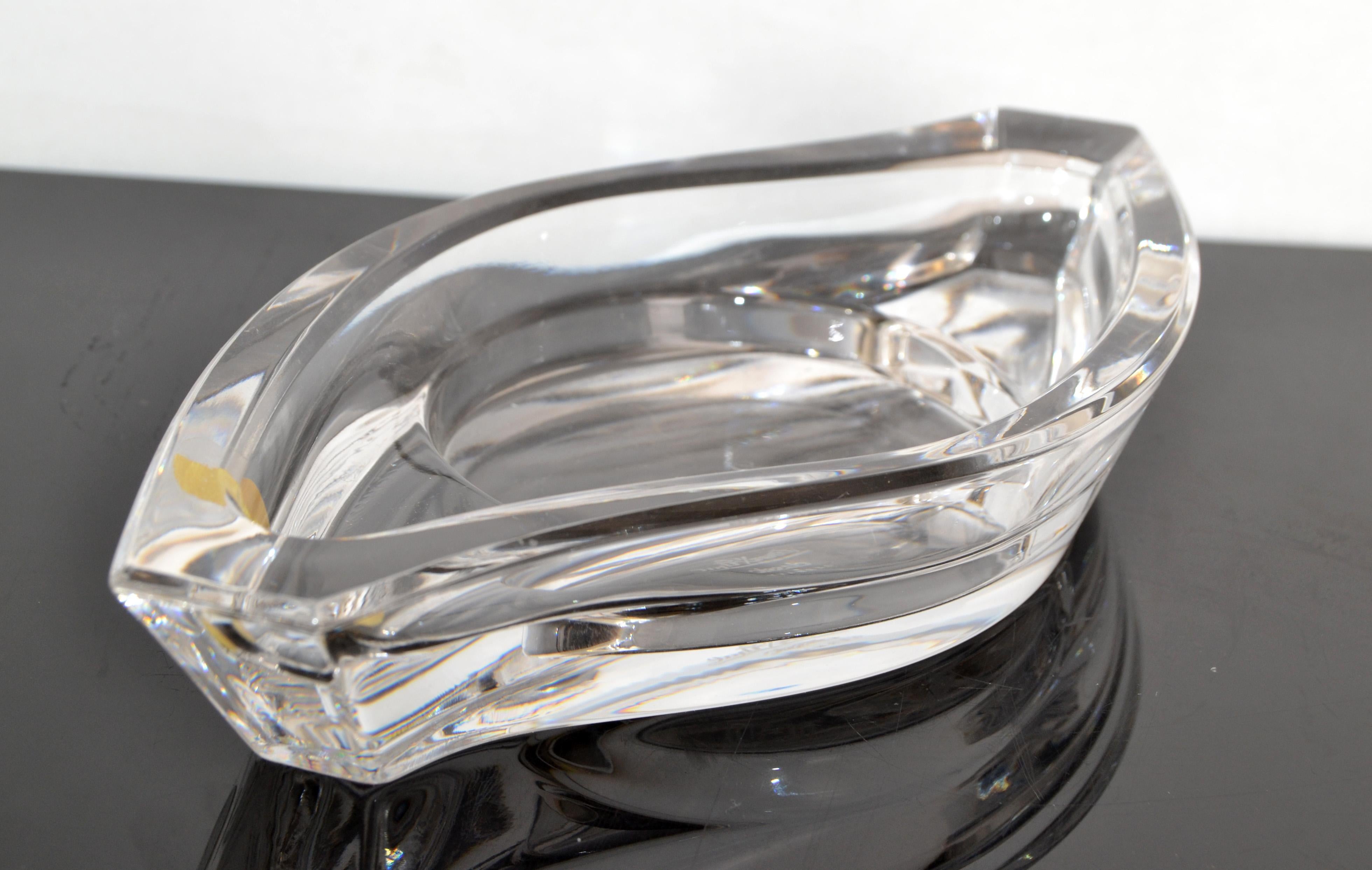 Striking original Rosenthal Space Age Lead crystal glass horizon pillar candle holder, vide poche, catchall, bowl made in Germany. 
To me it looks like the shape of an eye and will look amazing on top of a black credenza, hallway table or