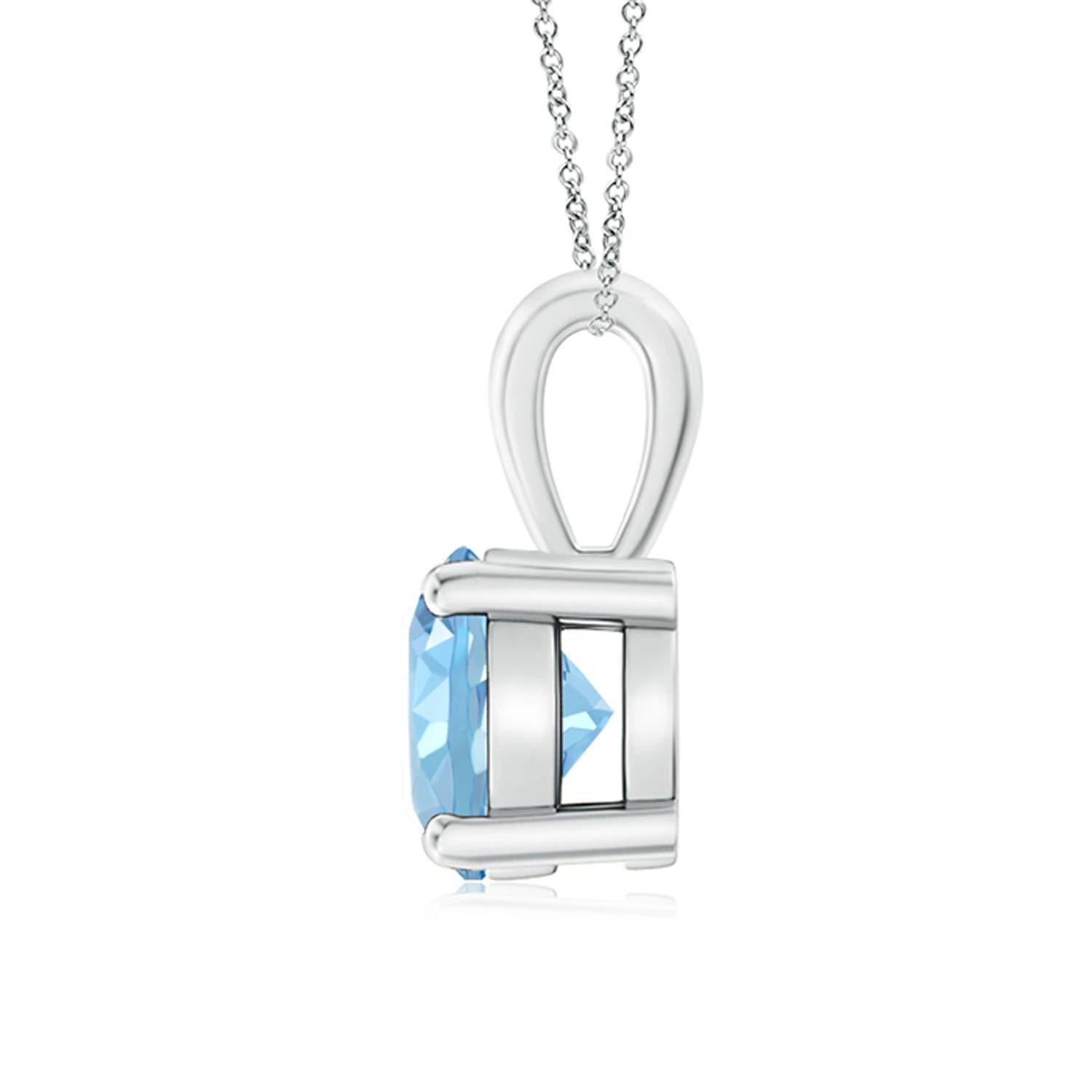 Linked to a lustrous bale is a sea blue aquamarine solitaire secured in a four prong setting. Crafted in silver, the elegant design of this classic aquamarine pendant draws all attention towards the magnificence of the center stone. Available in