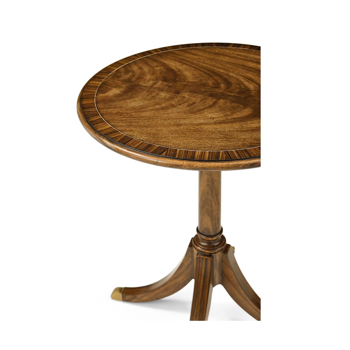 Bring refined Regency-era style into the modern home with its elegant proportions and luxurious craftsmanship. The round top features a stunning figured crotch veneer with crossbanding detail that adds a sense of tailored refinement.

A turned