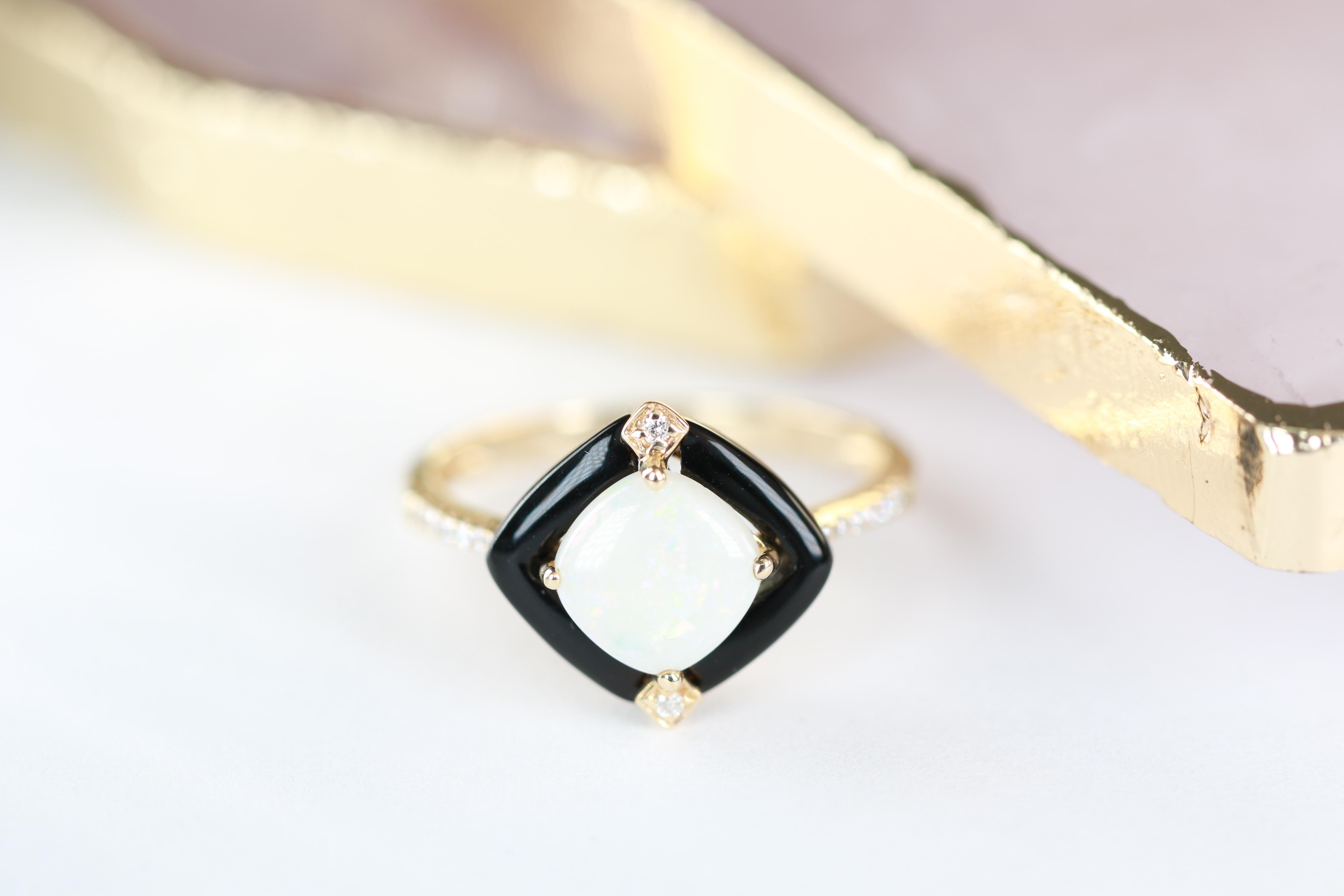 Stunning, timeless and classy eternity Unique Ring. Decorate yourself in luxury with this Gin & Grace Ring. The 14K Yellow Gold jewelry boasts with Round-cab 1 pcs 0.78 carat, Fancy-cut Onyx 2 pcs 1.21 carat, Natural Round-cut white Diamond (14 Pcs)