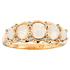 Anillo clásico de oro amarillo de 14k con ópalo etíope de talla redonda y diamante blanco