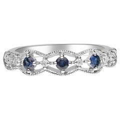 Anillo clásico de zafiro azul talla redonda con diamante redondo de oro blanco de 18 quilates
