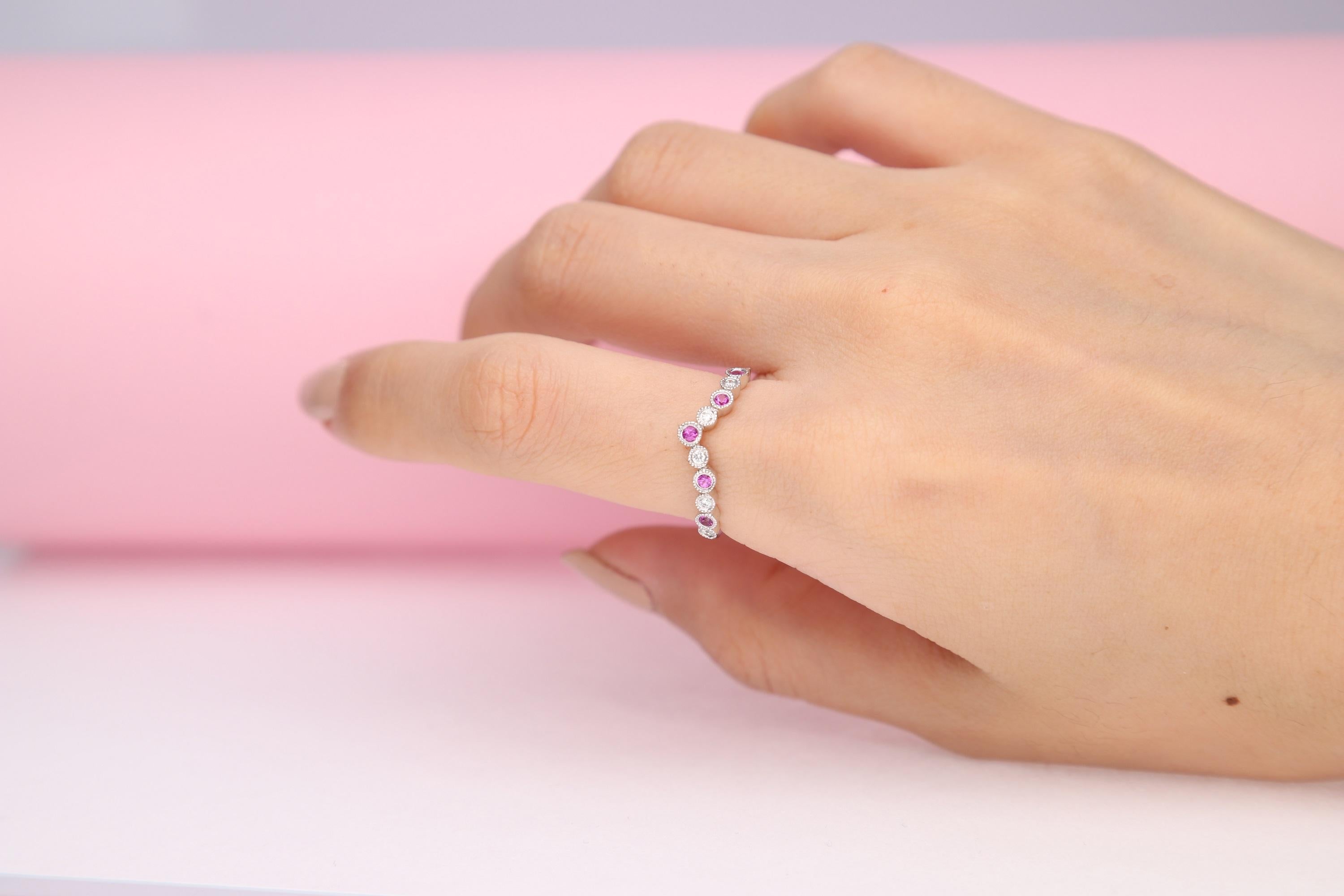 Stunning, timeless and classy eternity Unique Ring. Decorate yourself in luxury with this Gin & Grace Ring. The 14K White Gold jewelry boasts with Oval-cut 5 pcs 0.19 carat Hot Pink Ruby and Natural Round-cut white Diamond (6 Pcs) 0.09 Carat accent