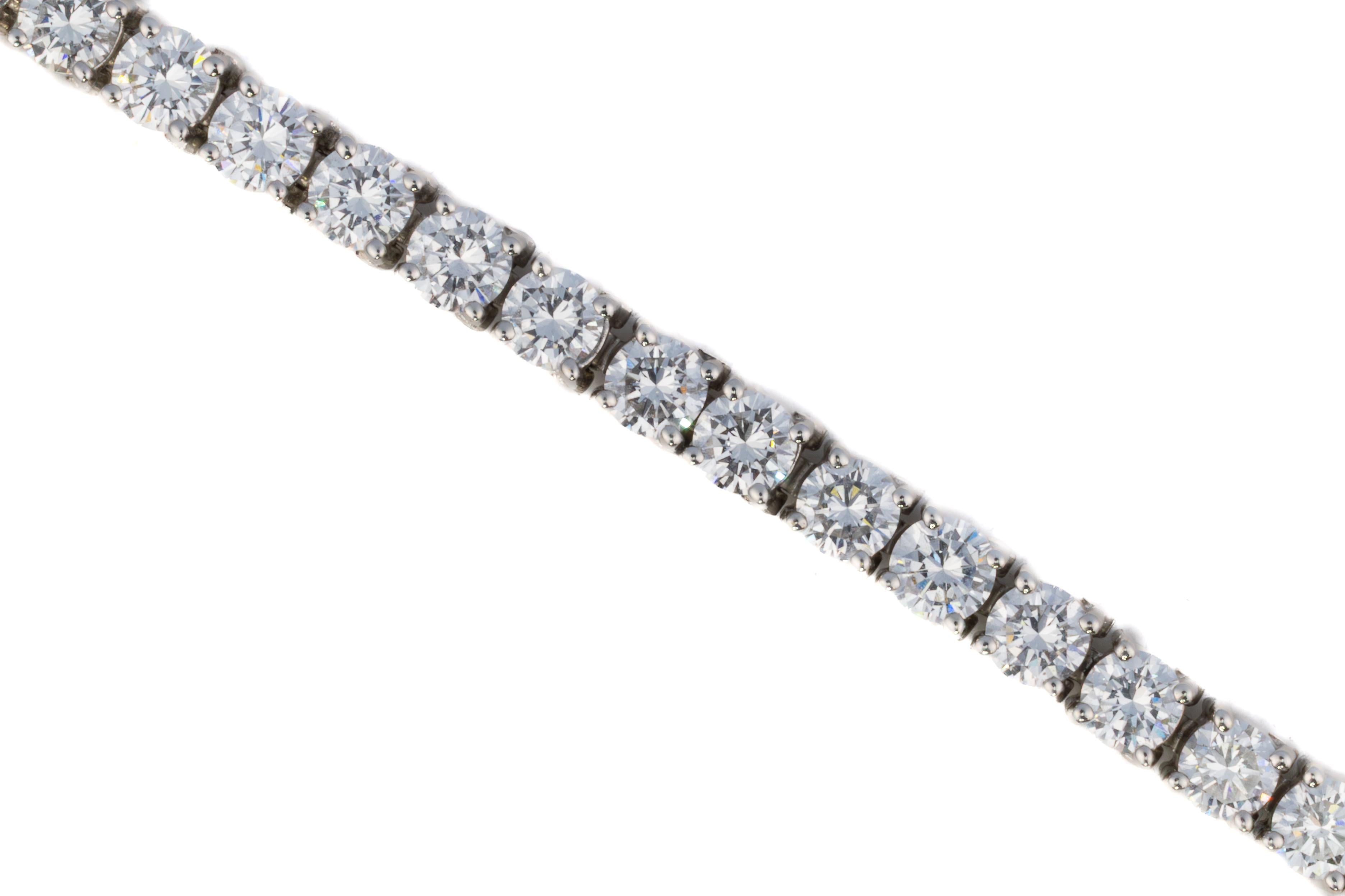 Classic Round Cut Tennis Bracelet

Description:
This timeless tennis bracelet showcases a continuous line of round brilliant cut diamonds, each set in a clean, secure setting that allows maximum light to pass through and illuminate every stone.