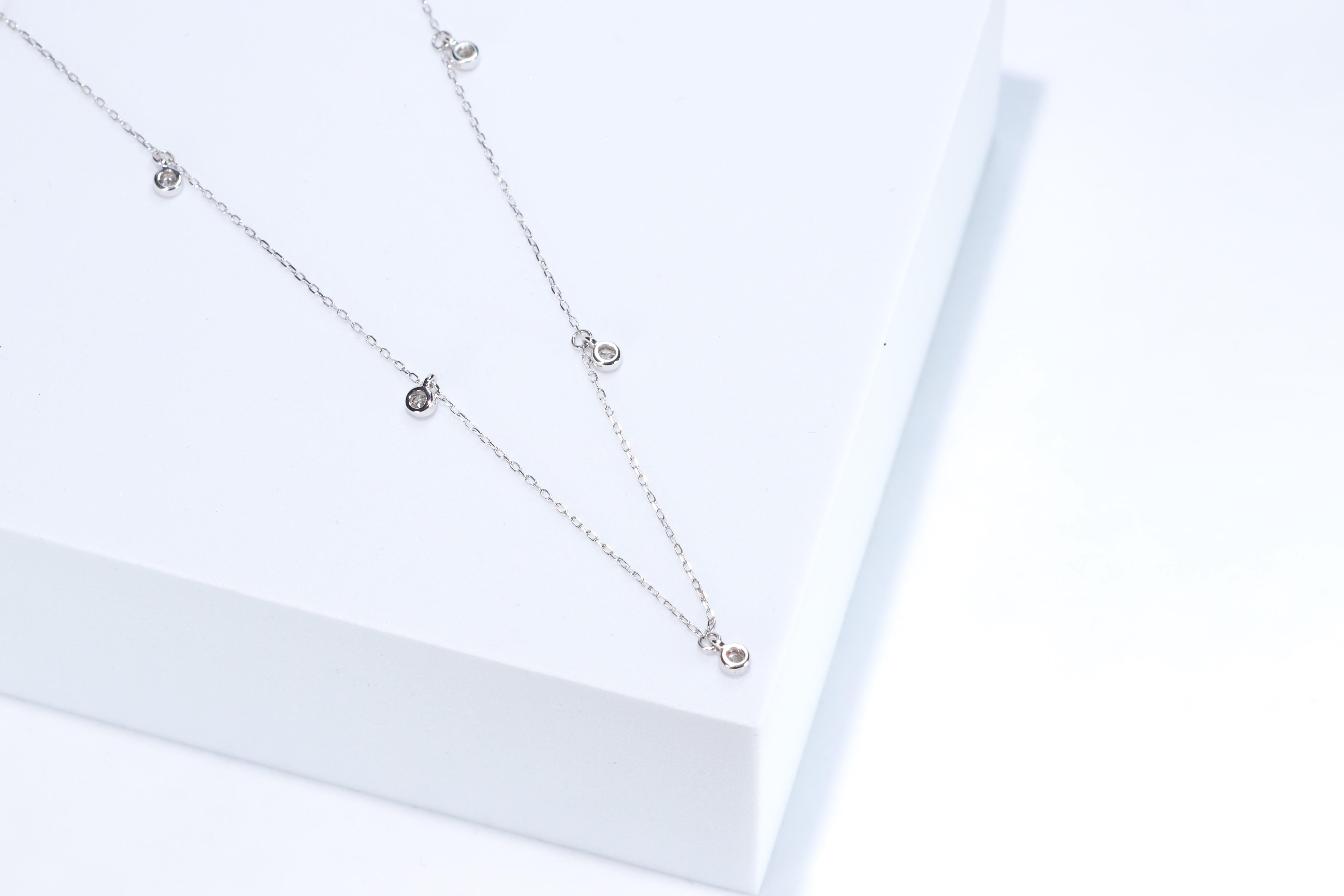 Stunning, timeless and classy eternity Unique Necklace. Decorate yourself in luxury with this Gin & Grace Necklace. The 14K White Gold jewelry boasts with Natural Round-cut white Diamond (5 Pcs) 0.23 Carat accent stones for a lovely design. This
