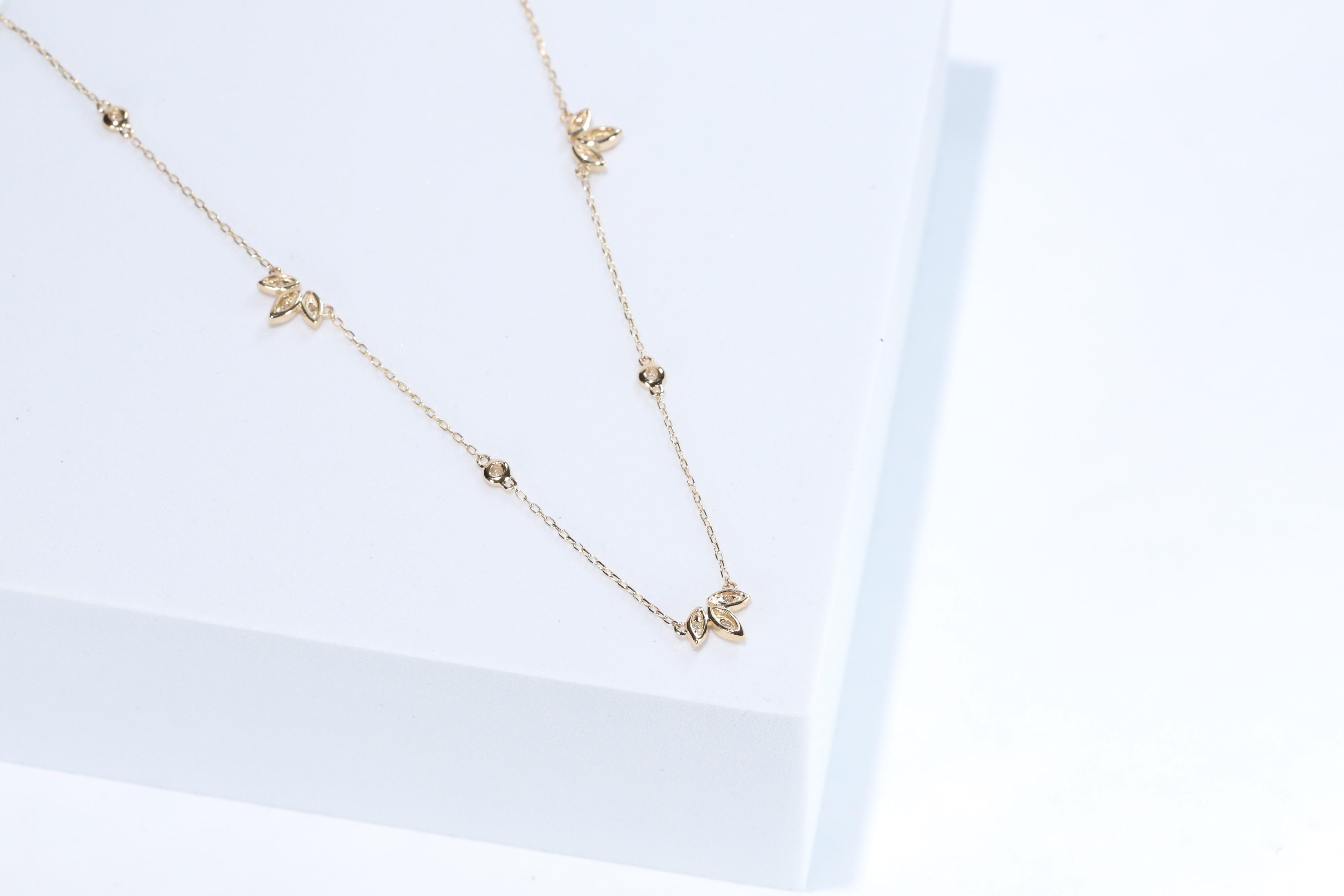 Stunning, timeless and classy eternity Unique Necklace. Decorate yourself in luxury with this Gin & Grace Necklace. The 14K Yellow Gold jewelry boasts with Natural Round-cut white Diamond (13 Pcs) 0.20 Carat accent stones for a lovely design. This