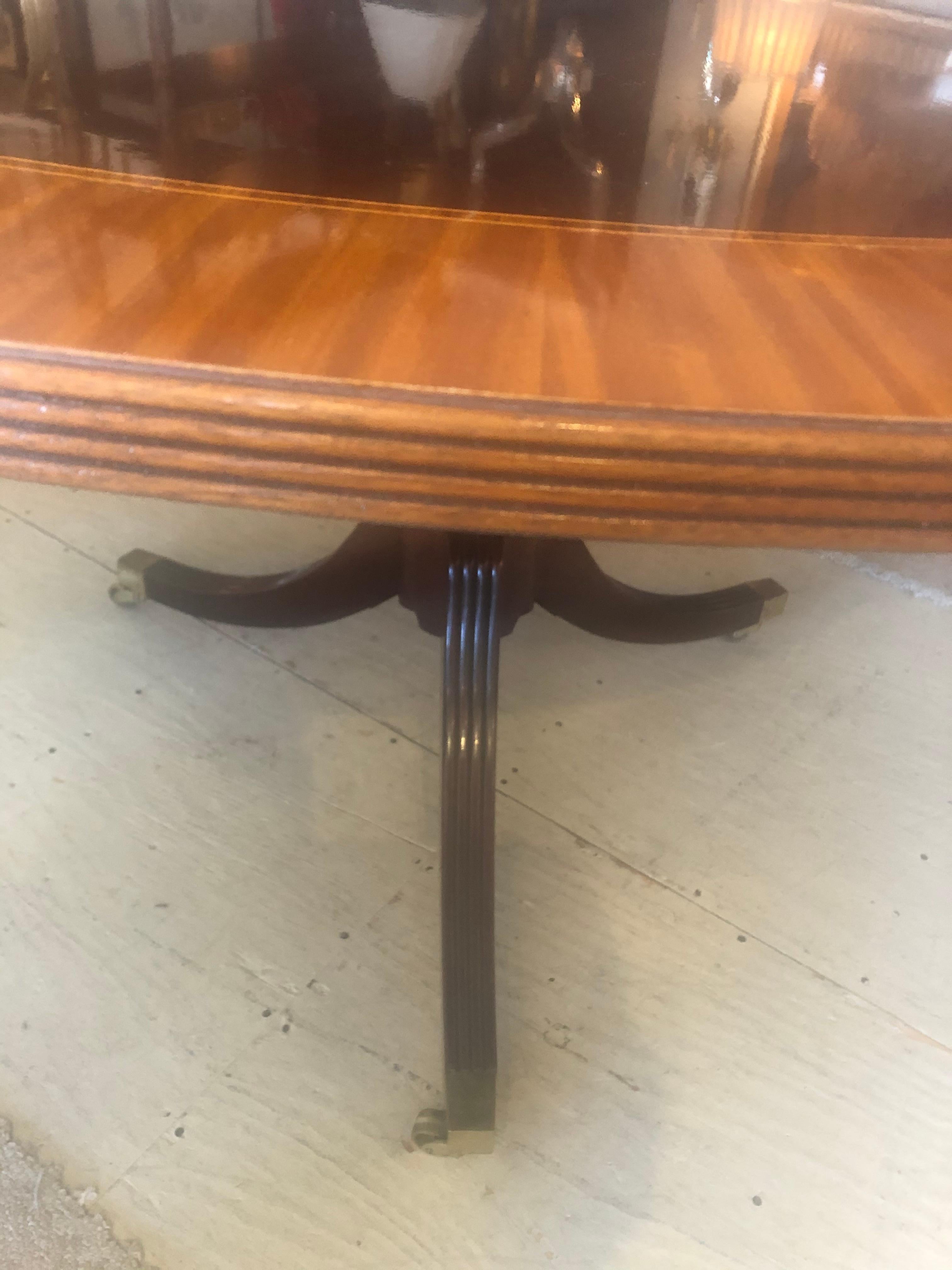 Mid-20th Century Classic Round Mahogany and Banded Satinwood Dining Table Center Table by Baker
