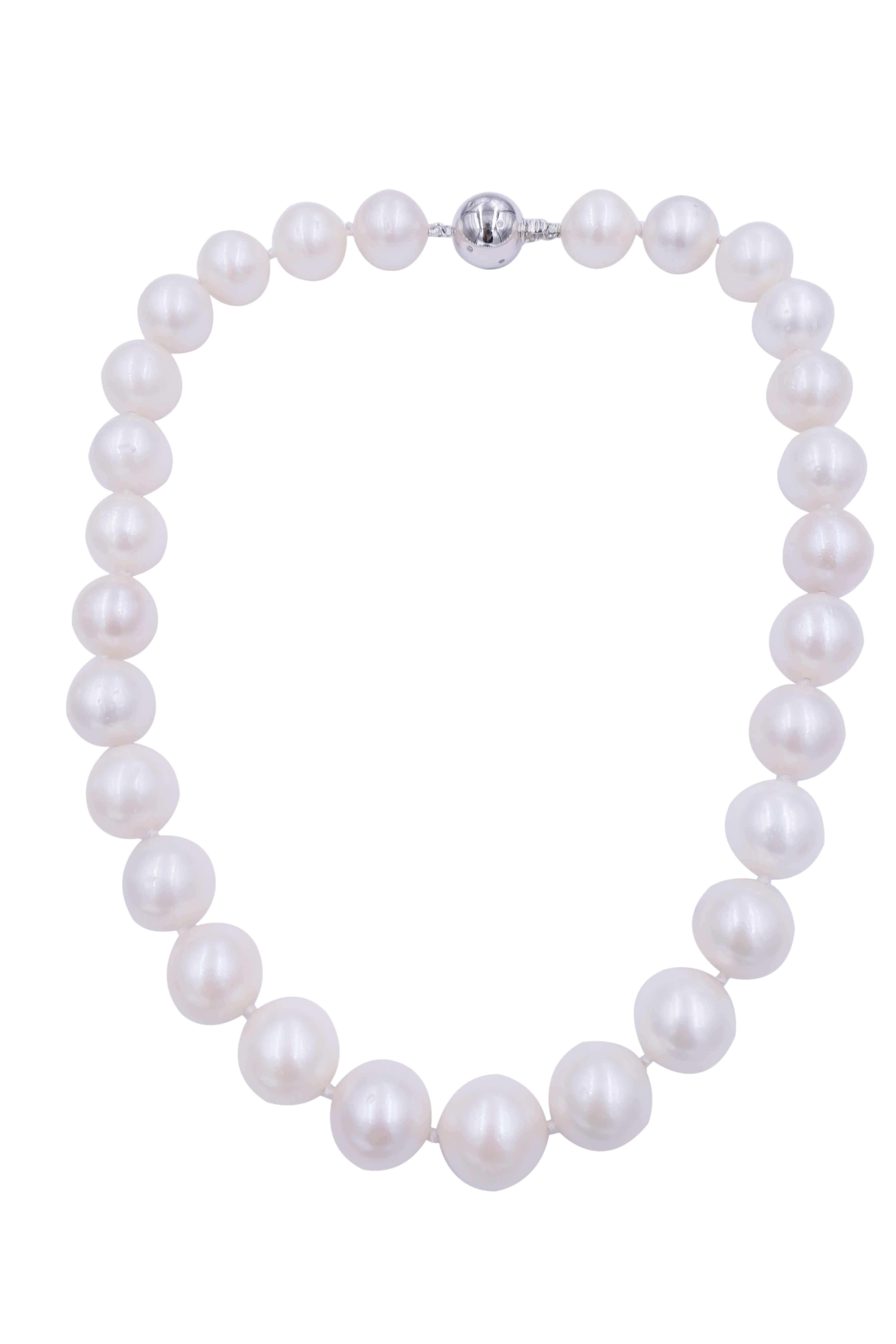 18K White Gold Clasp
0.15 cts Diamonds 
South Sea Pearls with Amazing Luster, Color and Shine - White with Slightly Cream Hue & Overtones - A Quality - 13-14 MM Sizes
17 Inches Length
High-Quality Pearls + Make