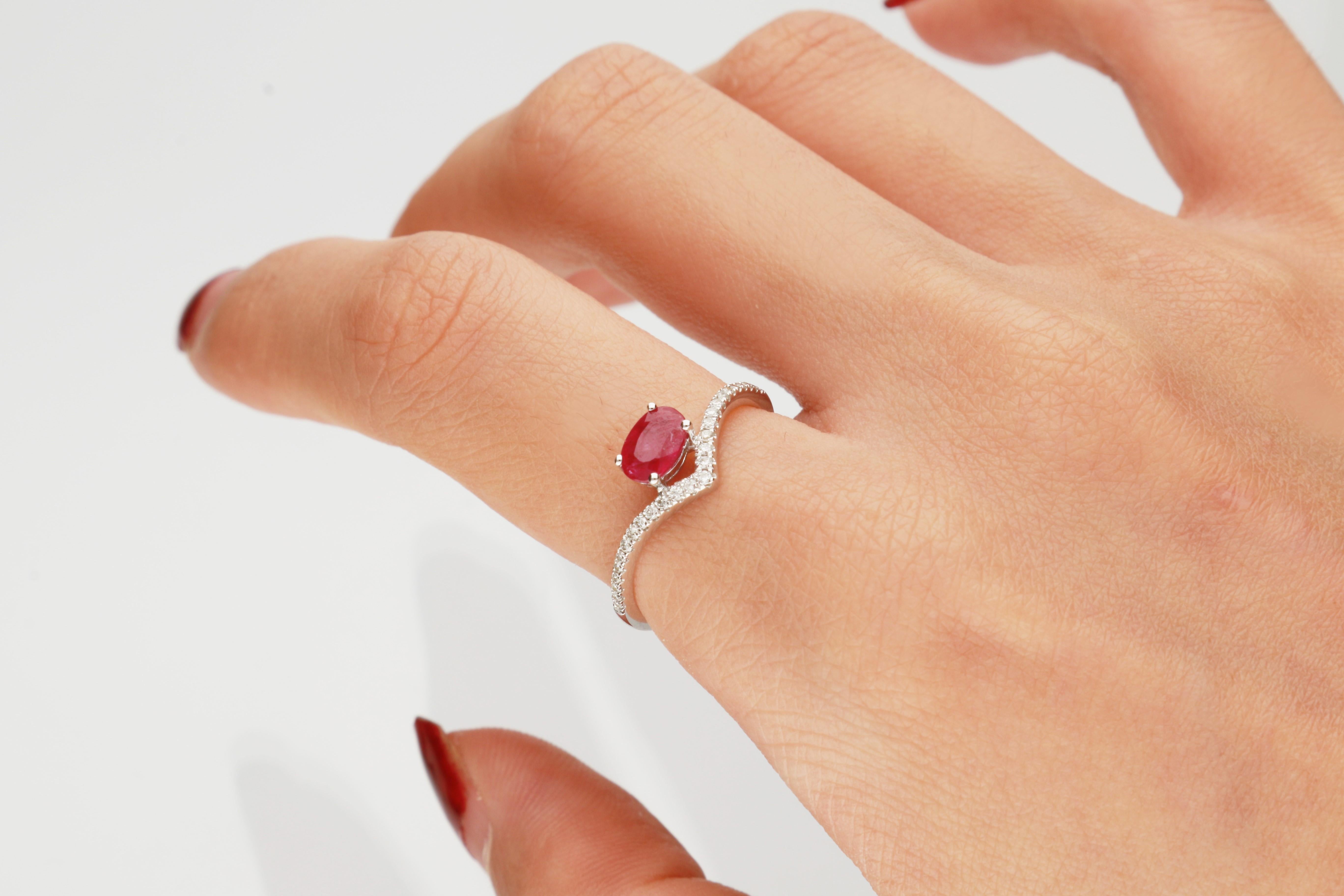 Stunning, timeless and classy eternity Unique Ring. Decorate yourself in luxury with this Gin & Grace Ring. The 14K White Gold jewelry boasts with Oval-cut 1 pcs 0.57 carat Ruby and Natural Round-cut white Diamond (27 Pcs) 0.10 Carat accent stones