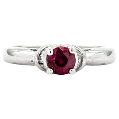 Bague classique rubis et diamants