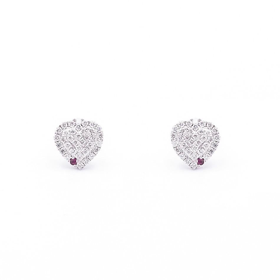 Earrings White Gold 14 K 

Diamond 68-RND-0,16-G/VS1A
Ruby 2-RND-0,007ct

Weight 0,83 grams

With a heritage of ancient fine Swiss jewelry traditions, NATKINA is a Geneva based jewellery brand, which creates modern jewellery masterpieces suitable