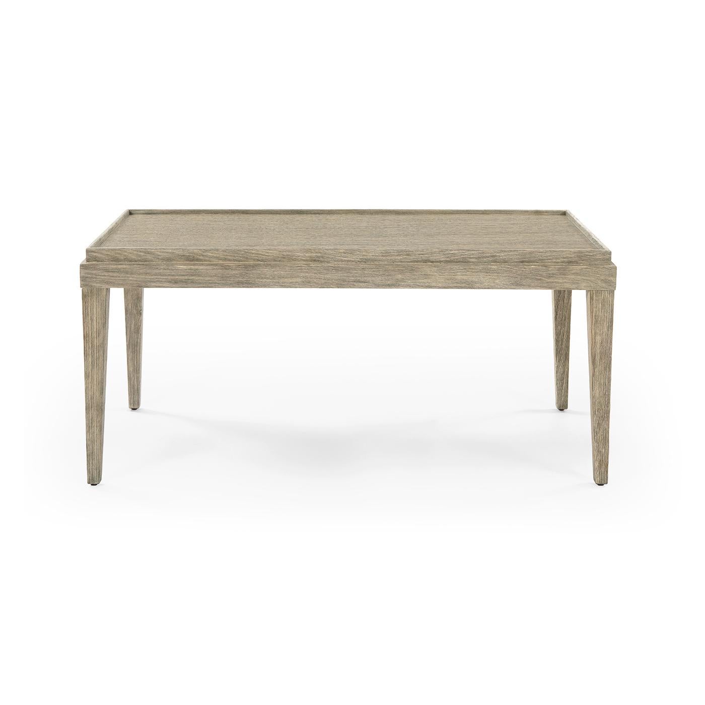 Table basse rectangulaire rustique classique avec notre finition unique en lapin. Avec un plateau galbé en bois, avec des pieds fuselés carrés.

La finition est notre 