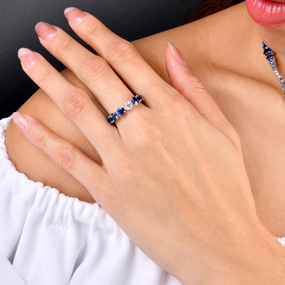 Elegant Sapphire and Diamond Eternity Band in 18K White Gold

Natural sapphires of approximately 4.87 carats, with 0.42 carats of round brilliant diamond.

Classic eternity band style, showcasing blue sapphires and diamond brilliance.

Ring size