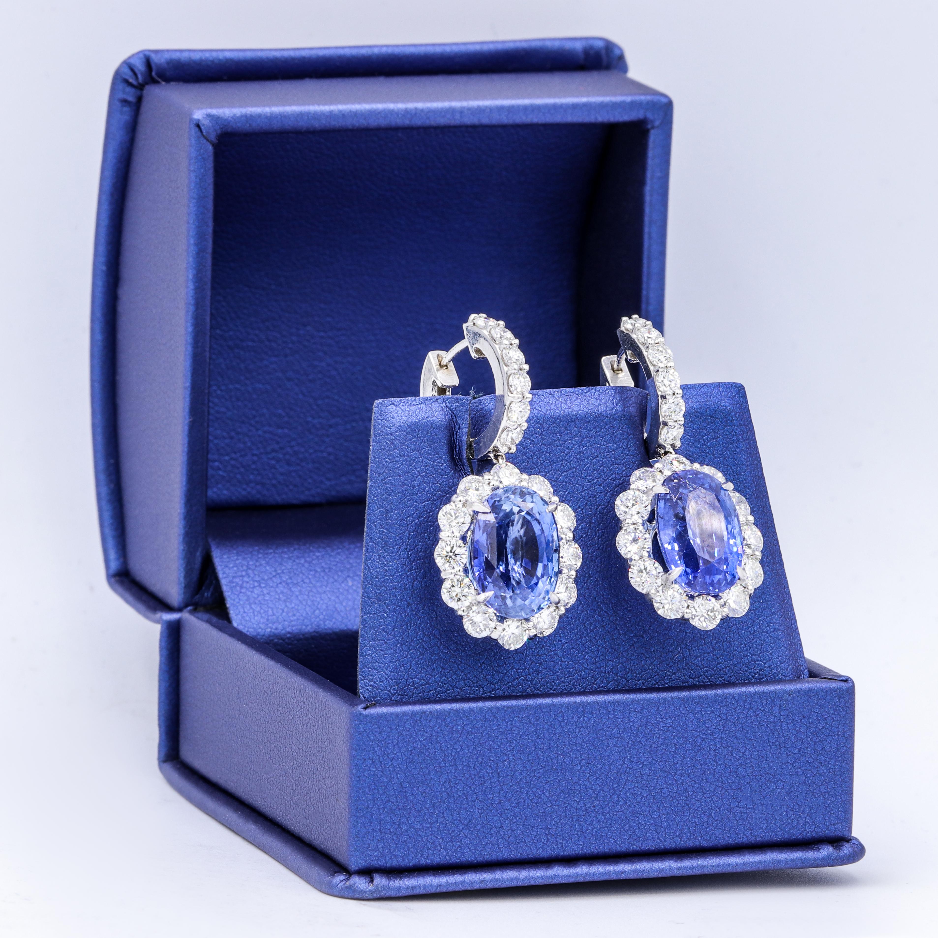 Classic sapphire diamond 18K white gold earring with GIA certified violetish blue sapphires 7.19 ct & 7.38 ct set with 4.80 ct  round diamonds all around.
