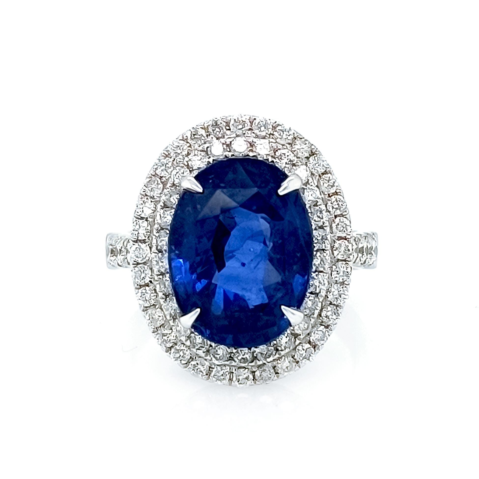 8.09 Ct sapphire and diamond double-halo ring 

Diamonds 1.15 Cts pave set in 14K white gold, 5.80 Grams