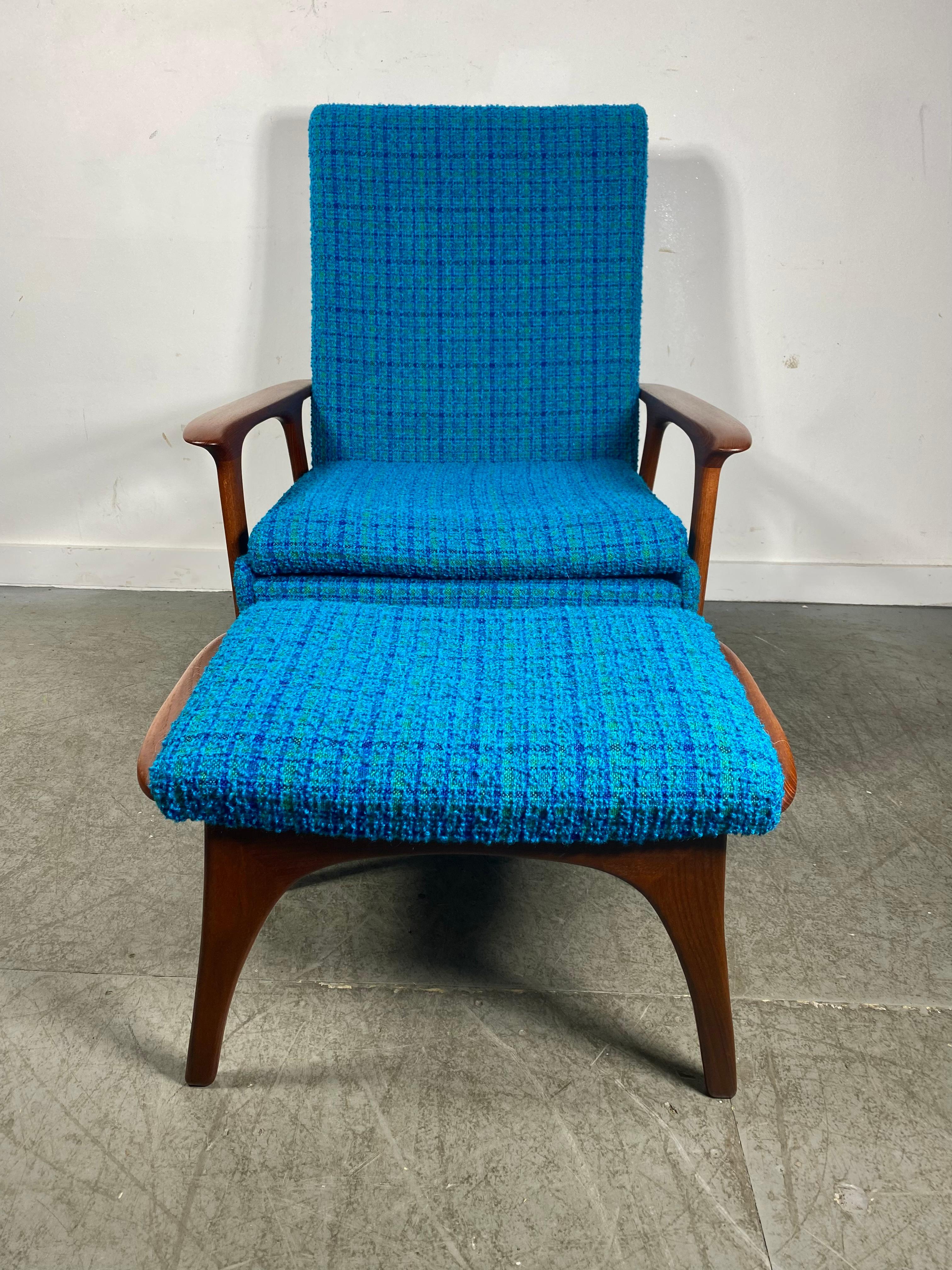 
Classic Scandinavian Modern Teak Lounge Chair and Ottoman, manner Of Hans Wegner. Superior quality and construction.Classic ,sleek deign. Retains original Electric Blue wool fabric upholstery in excellent original condition. interior seat cushion