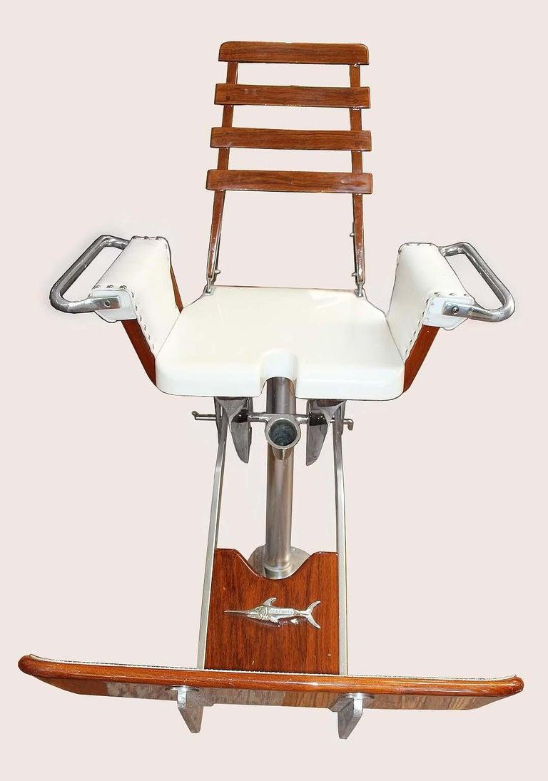 Scopinich fighting chair. Perfectly designed to be the most versatile lightweight chair on the market to accommodate the smaller cockpits with unlimited class rating. Features 21 x 21 Fiberglass seat. Anodized 6061 marine grade billet aluminum