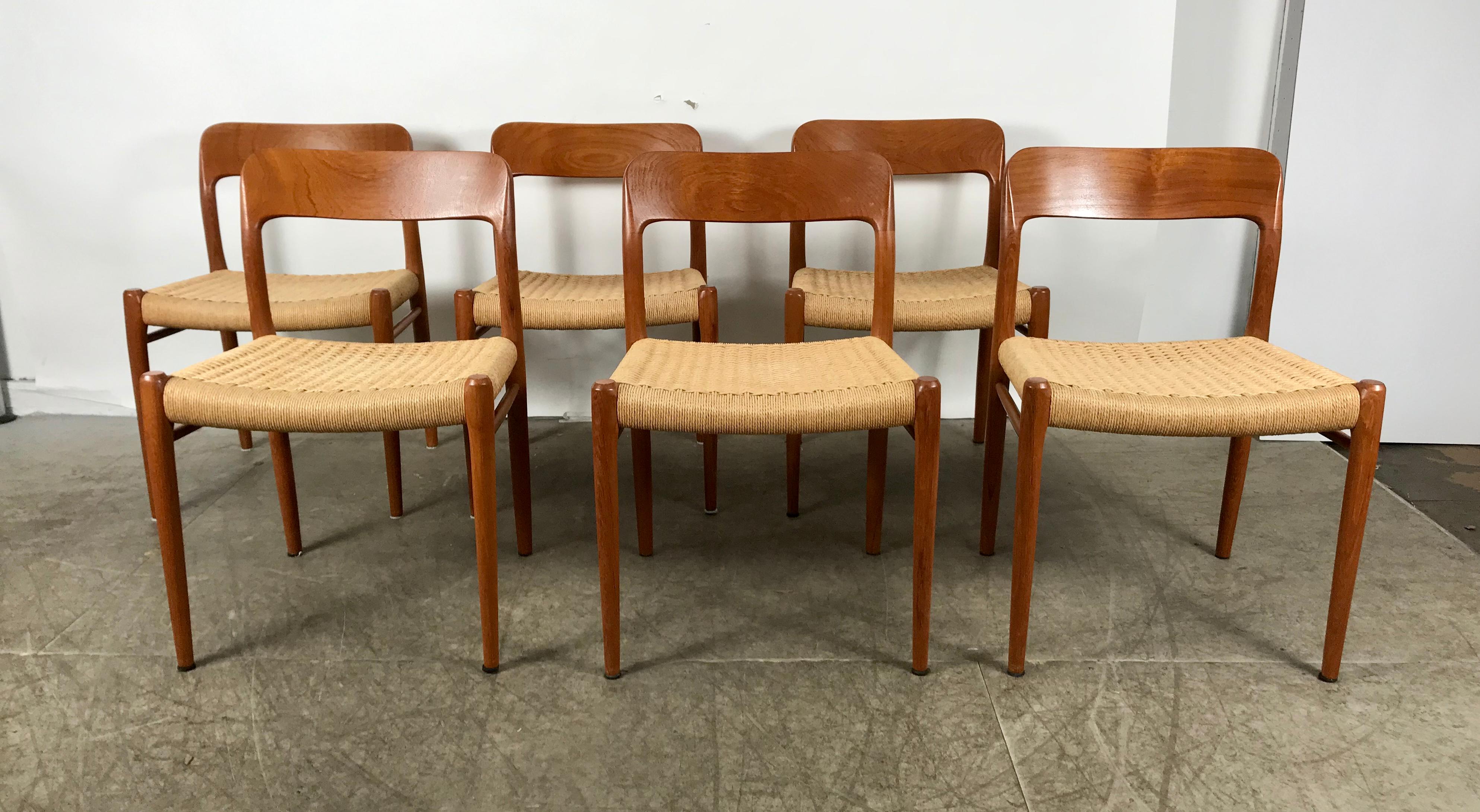 Classic set 6 teak and cane dining chairs ,Niels Moller model 75, Denmark, stunning set, amazing original condition, Warm grained teak wood finish, caning in excellent condition, extremely comfortable, All chairs ink stamped J L MOLLER made in