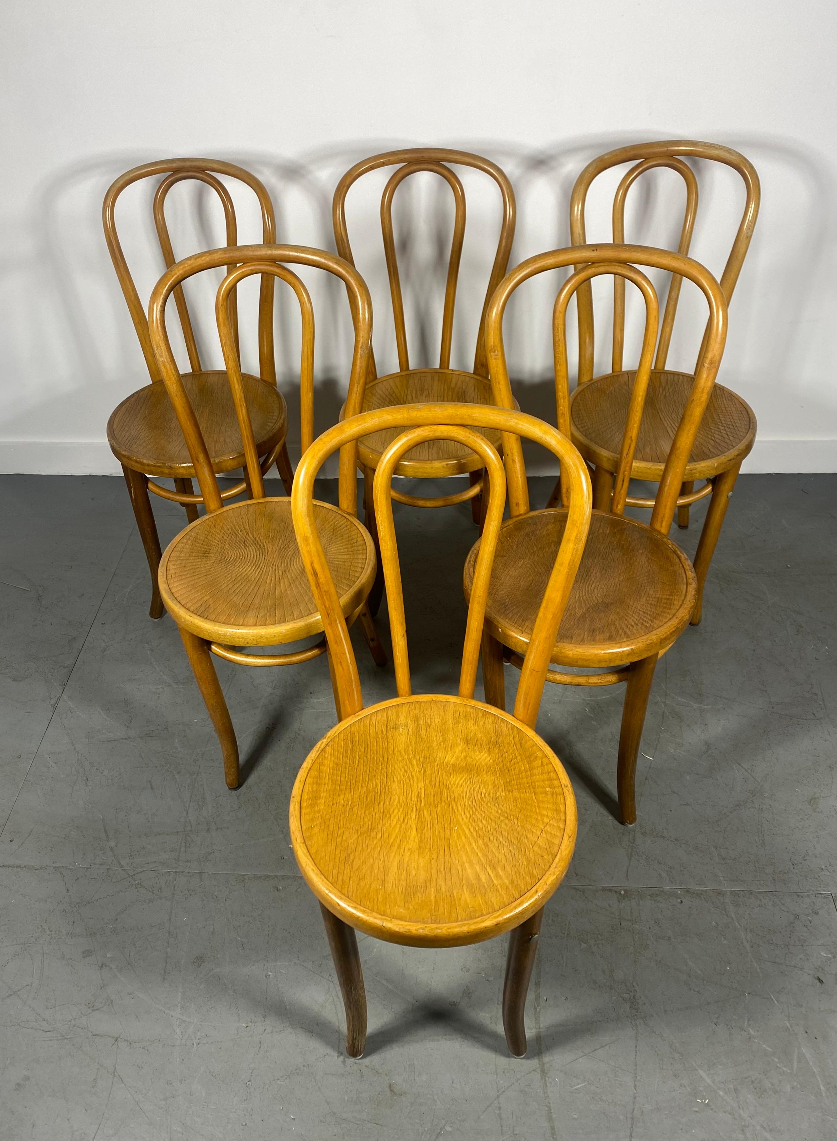 Classic set 6 Thonet Bentwood Dining /Bistro chairs, model # 18.Labeled Made in Czechoslovakia.Nuce clean matched set, Retains original warm honey blonde finish,,wonderful patina. Two chairs reinforced (bolt ). see photo. Structurally sound, tight,