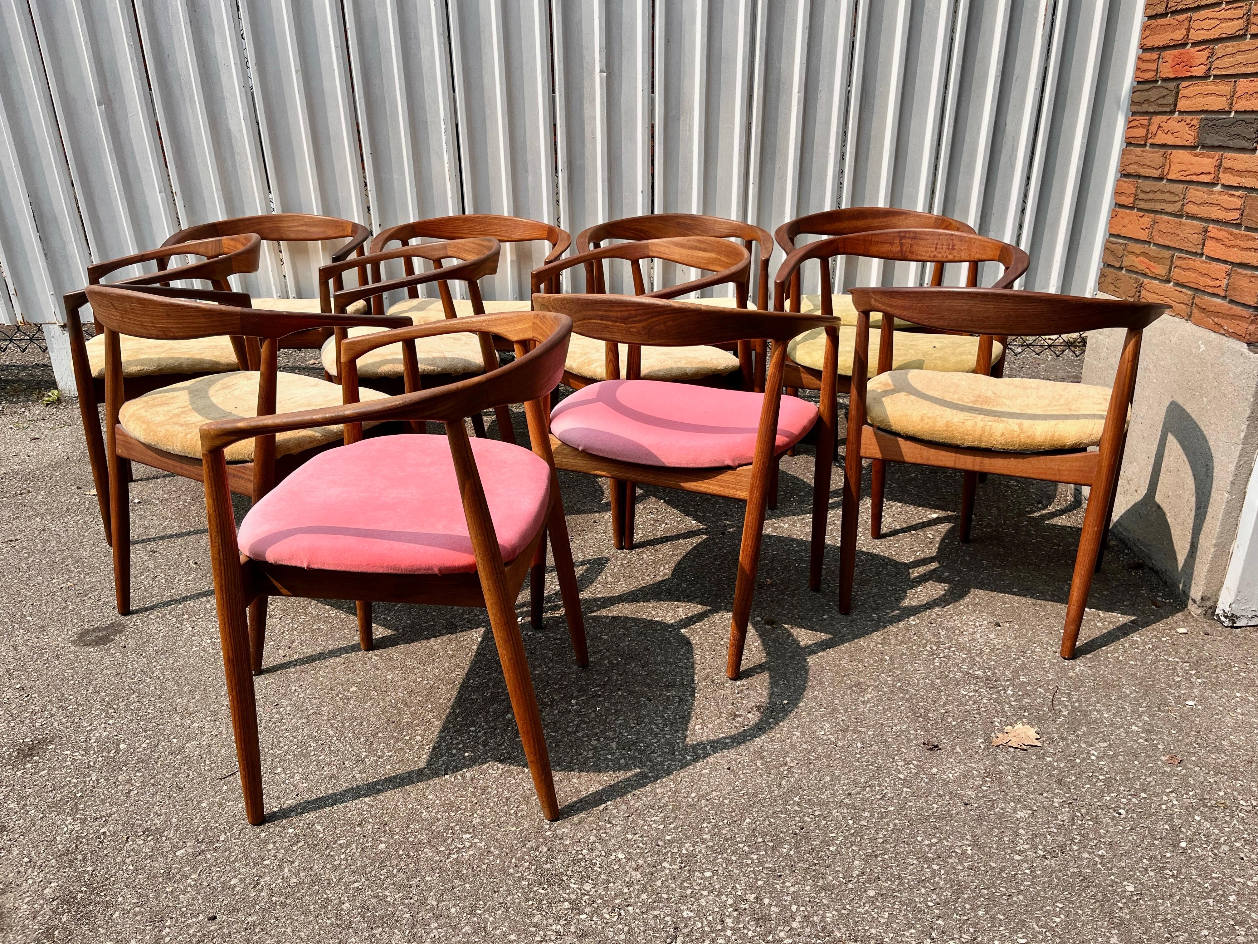 Stunning set of 12 Kai Kristiansen 'Troja' round chair from circa 1955... designed in the style of famed Hans Wegner Chair,. The frame is made from Afromosia Teak wood which retains its original finish and patina. Superior quality and construction,,