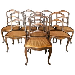 Classic Set of Eight French Walnut Caned Louis XV Ladderback Chairs