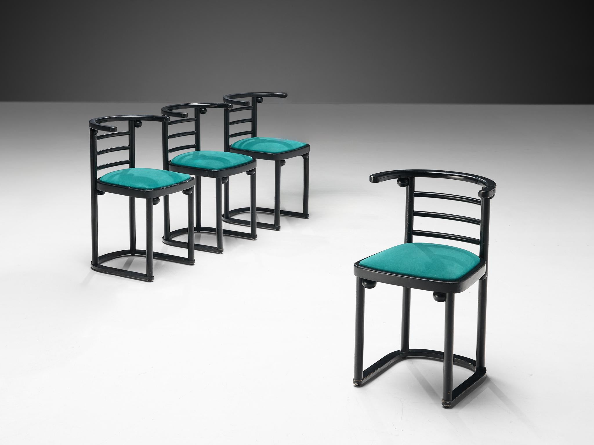 Set of four dining chairs, fabric, lacquered wood, Austria, 1980s 

These dining chairs have a strong resemblance to Josef Hoffmann ‘Fledermaus’ chair. The design has a splendid construction thanks to its bentwood that is enriched with round small
