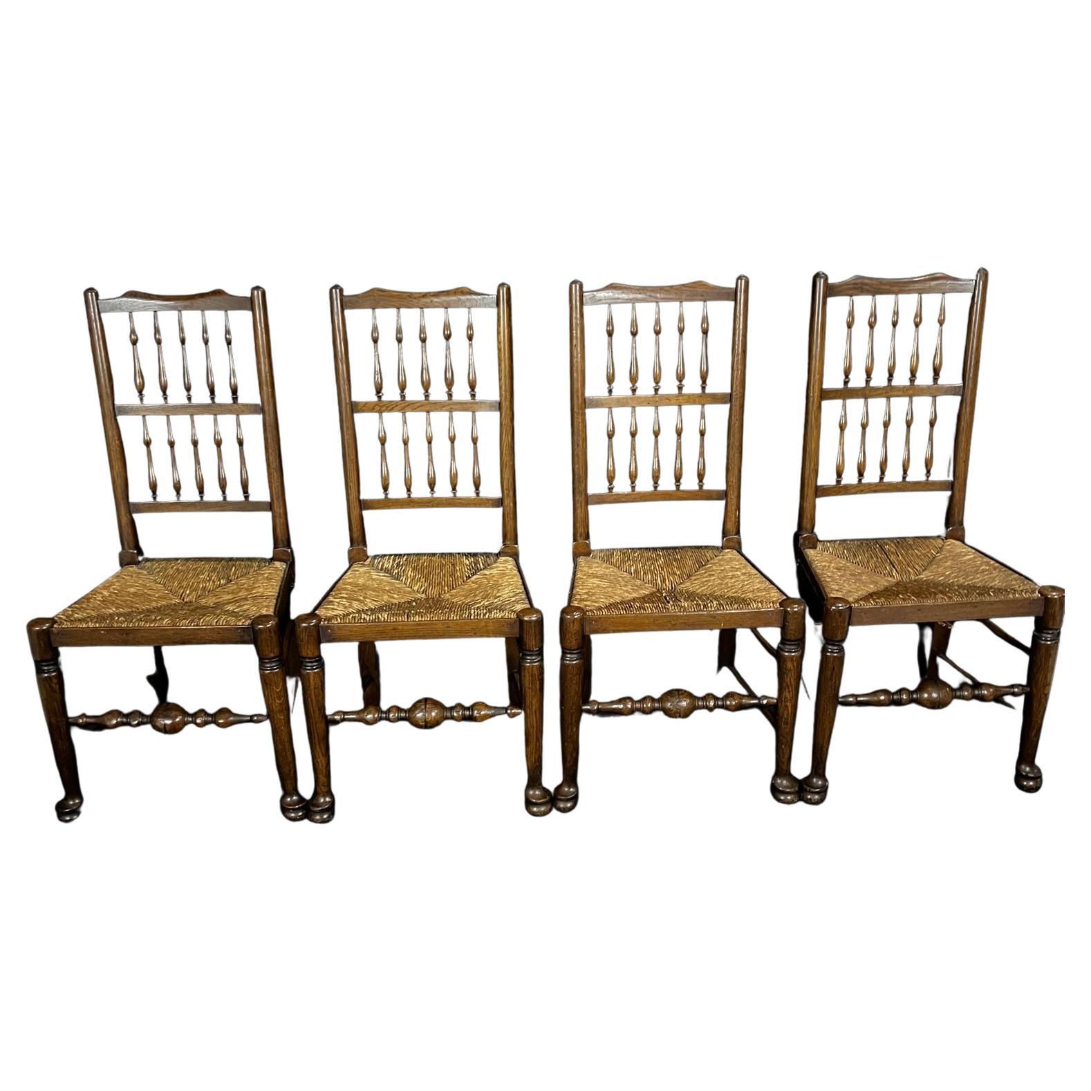 Classic Set of Four Early 19th Century Carved Oak British Dining Side Chairs For Sale