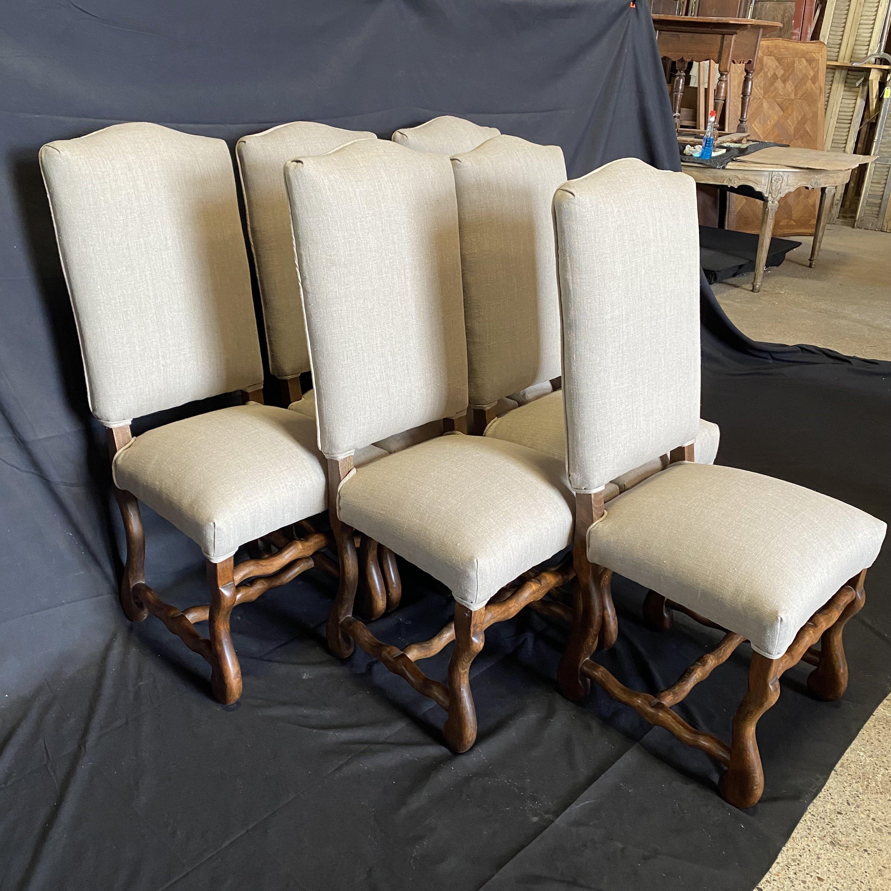 Beautiful and classic set of 6 walnut Os de Mouton side chairs from Lyon, France. Newly upholstered in a neutral french grayish beige cotton/linen blend. #5612.