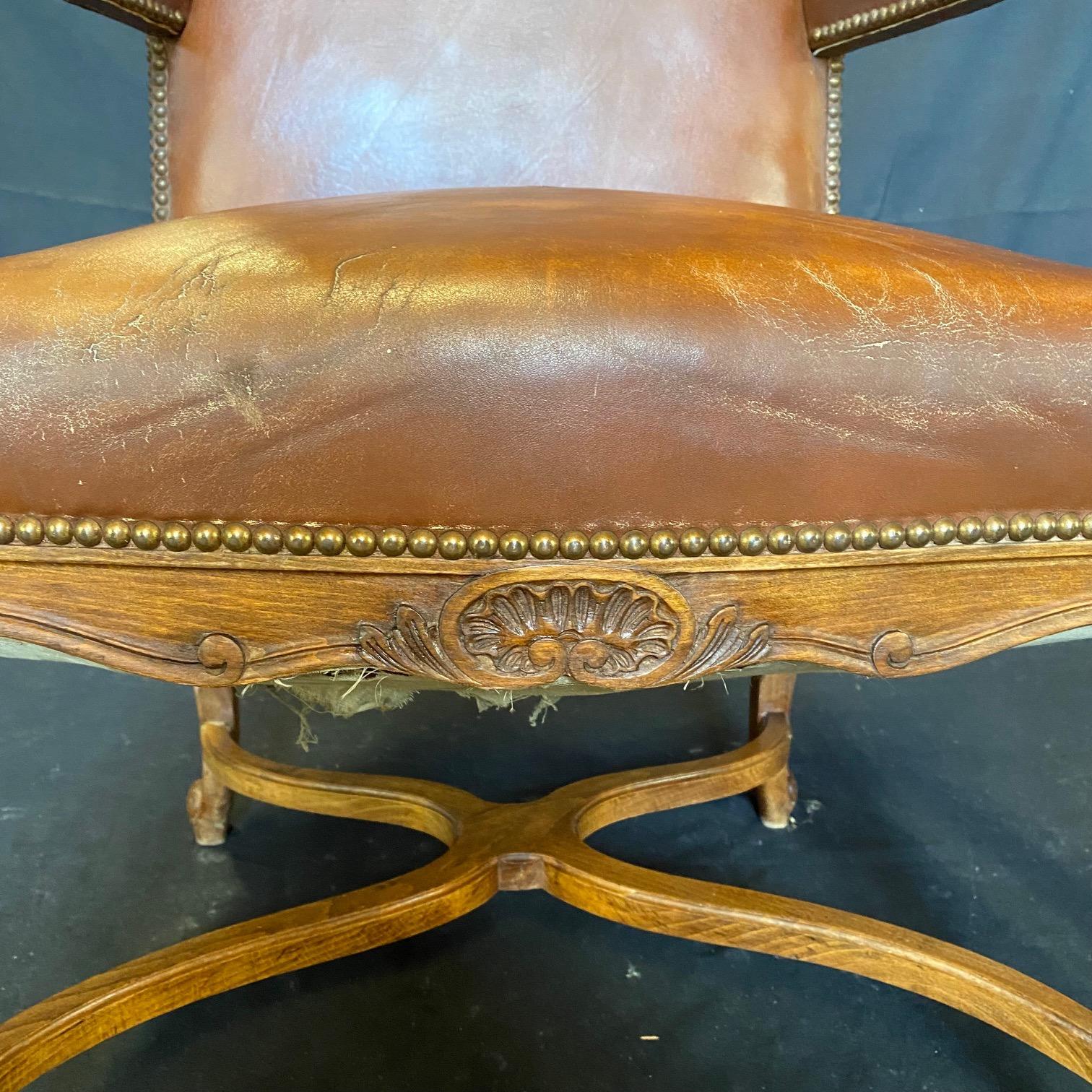 Classic Set of Three French Carved Wood and Leather Bergere Arm Chairs For Sale 9