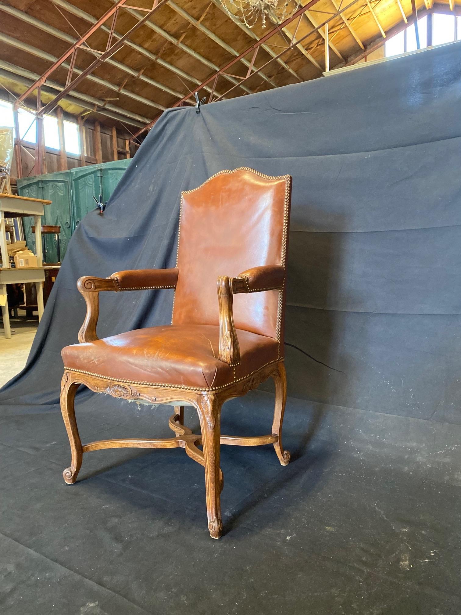 Classic Set of Three French Carved Wood and Leather Bergere Arm Chairs For Sale 1