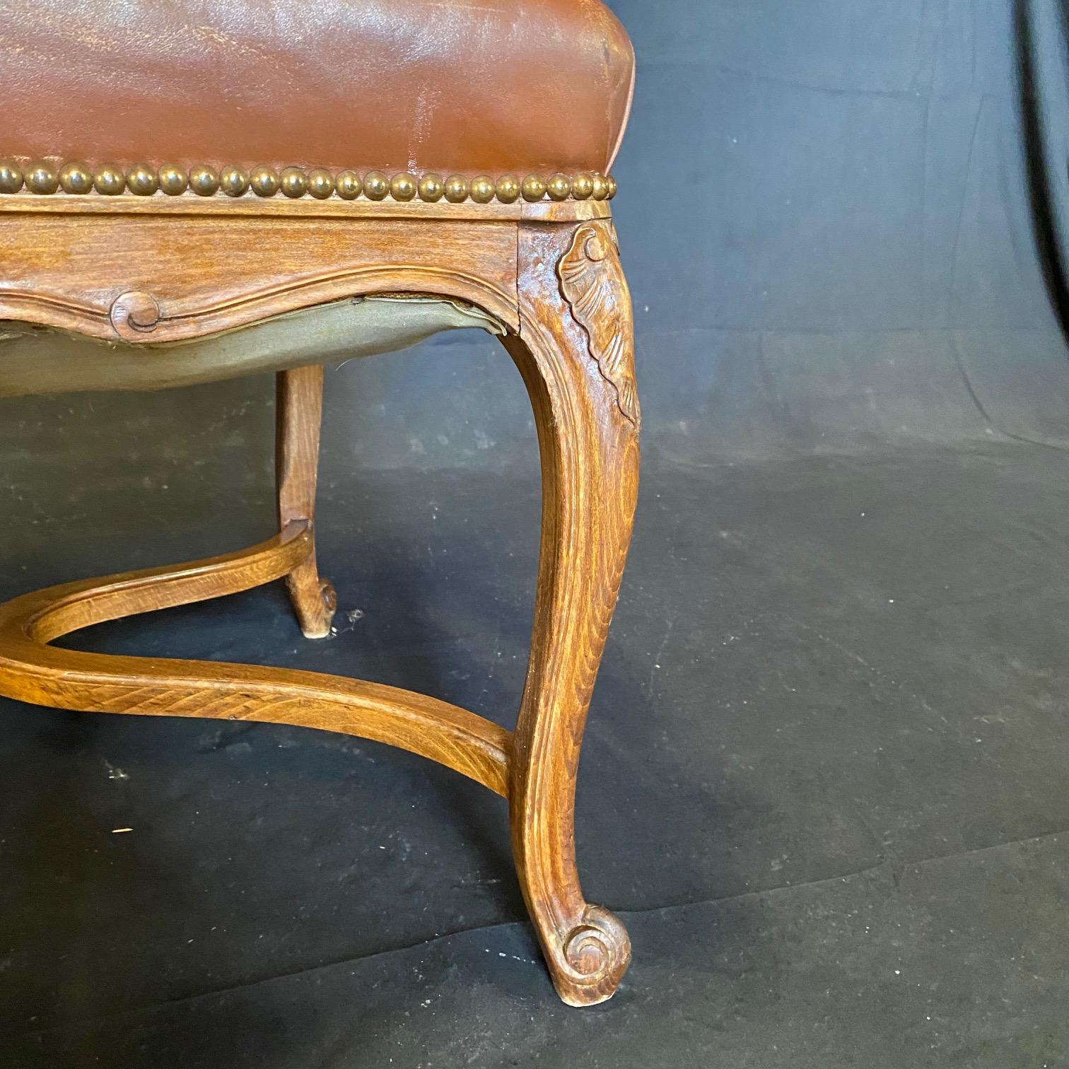 Classic Set of Three French Carved Wood and Leather Bergere Arm Chairs For Sale 2