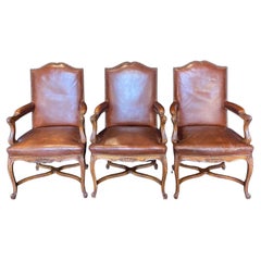 Classic Set of Three French Carved Wood and Leather Bergere Arm Chairs