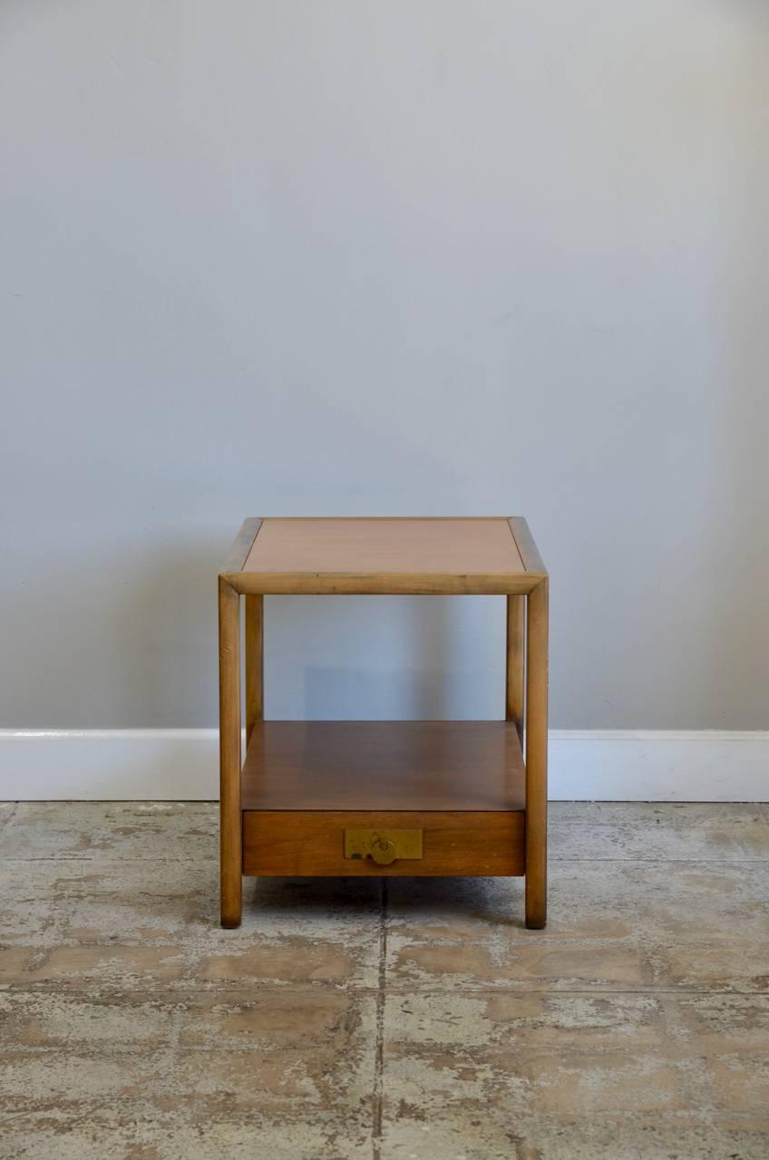 Classic Baker side table by Michael Taylor.

Top of the bottom drawer is 7.5 in. from floor.