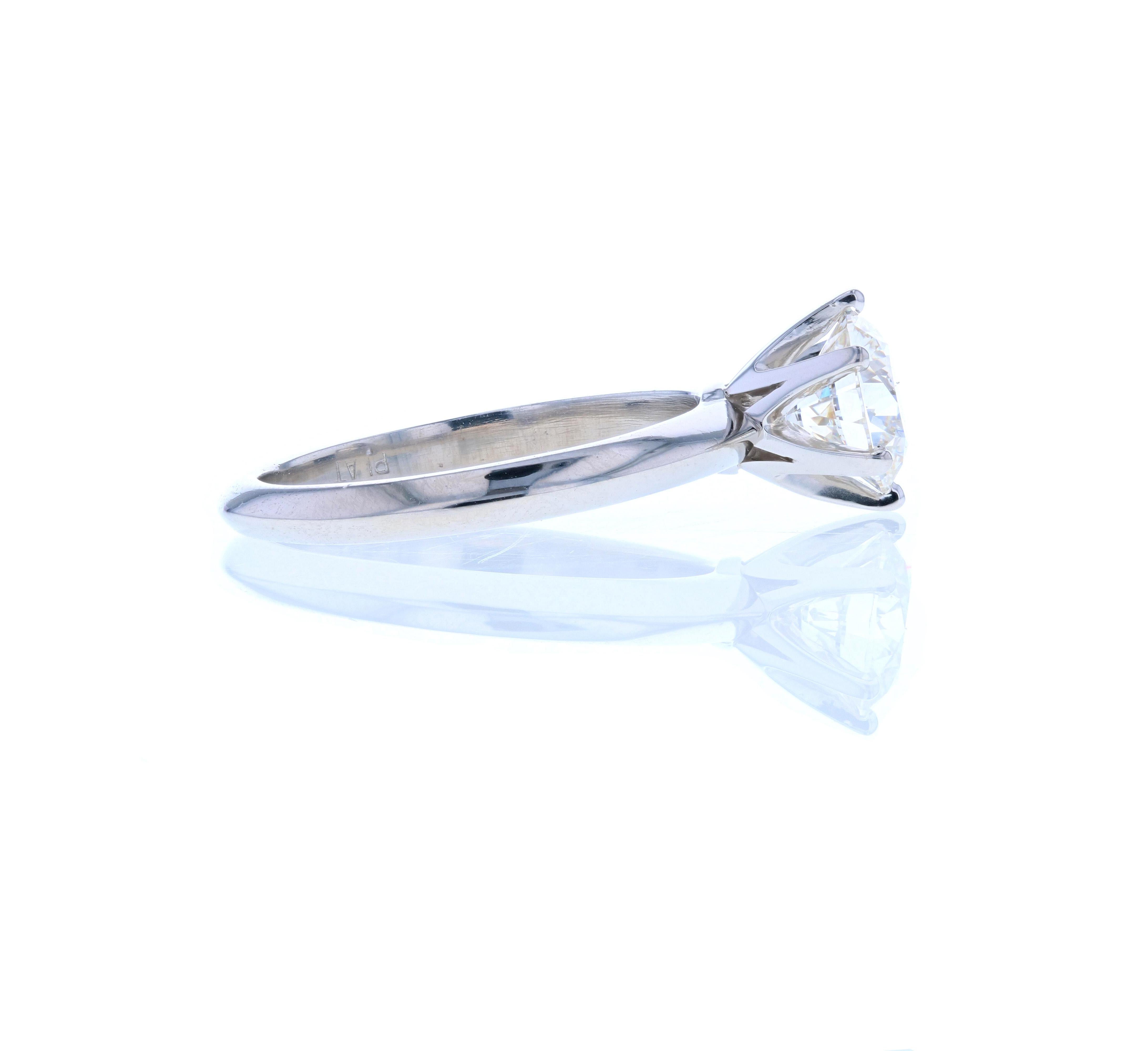 This classic six prong knife edge diamond engagement ring features a round center diamond that can be customized for any carat weight. The head of the ring is built-on the shank and can be made in any color gold as well as platinum. The six prong