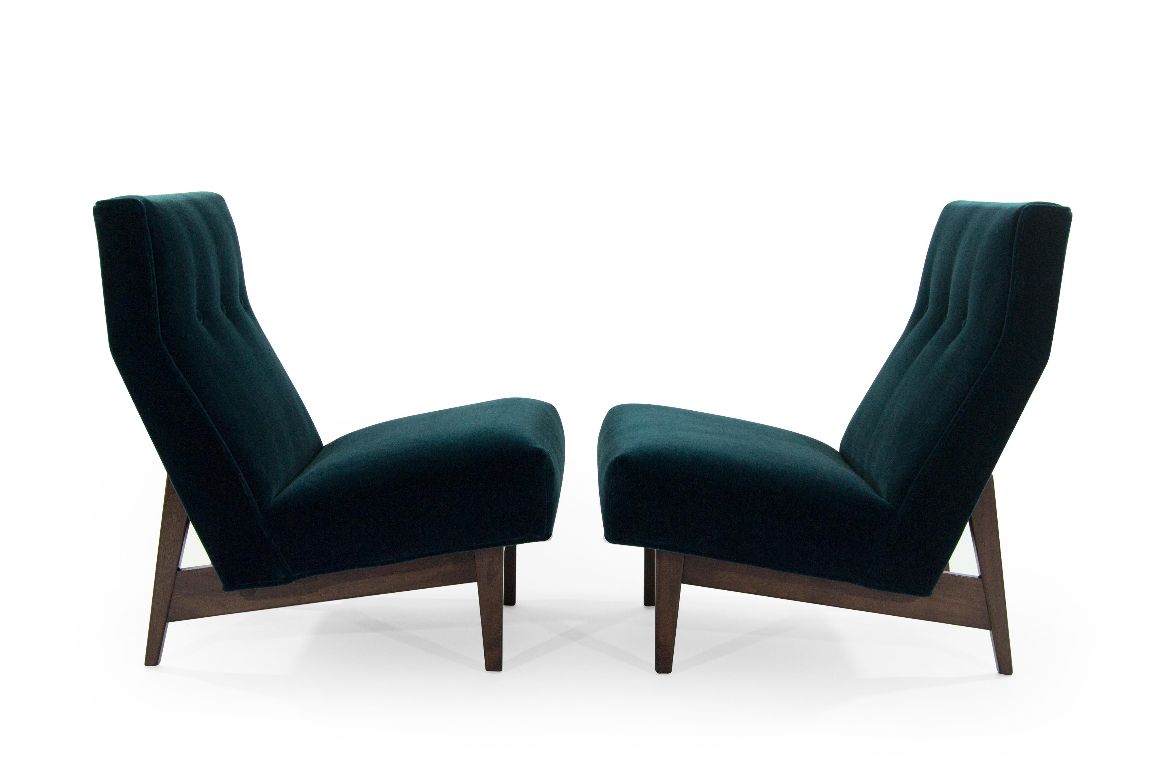 A set of slipper chairs designed by Jens Risom, circa 1950s. 

This pair has been fully restored down to its frame, fitted with hand cut high density foam. Newly upholstered in teal mohair 