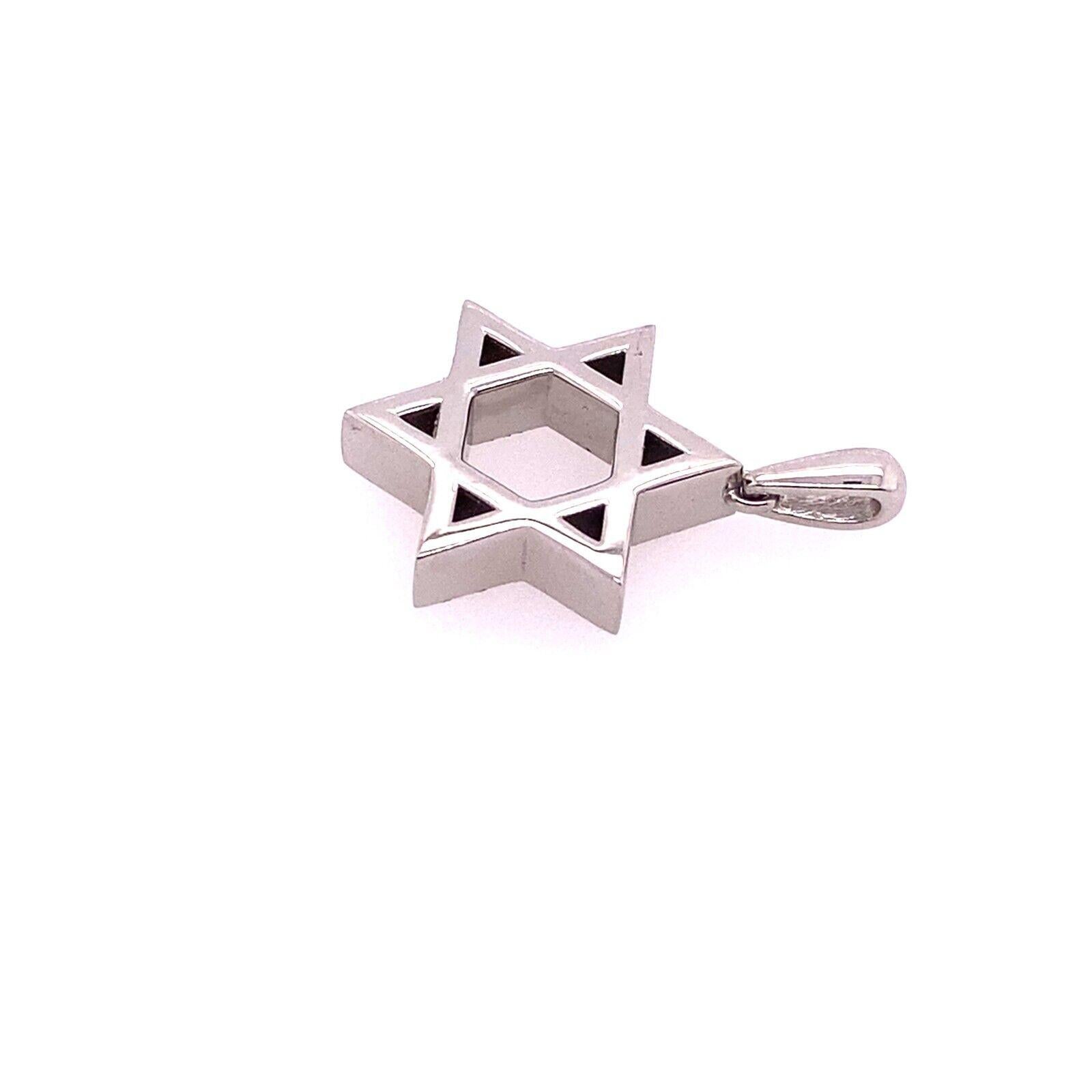 This 9ct solid White Gold Star of David pendant features a high shine finish in one side and texture on the other side, with 9ct jump ring. The pendant is 16.70mm in diameter and weighs 4.0g and is an ideal gift for any occasion.

Additional