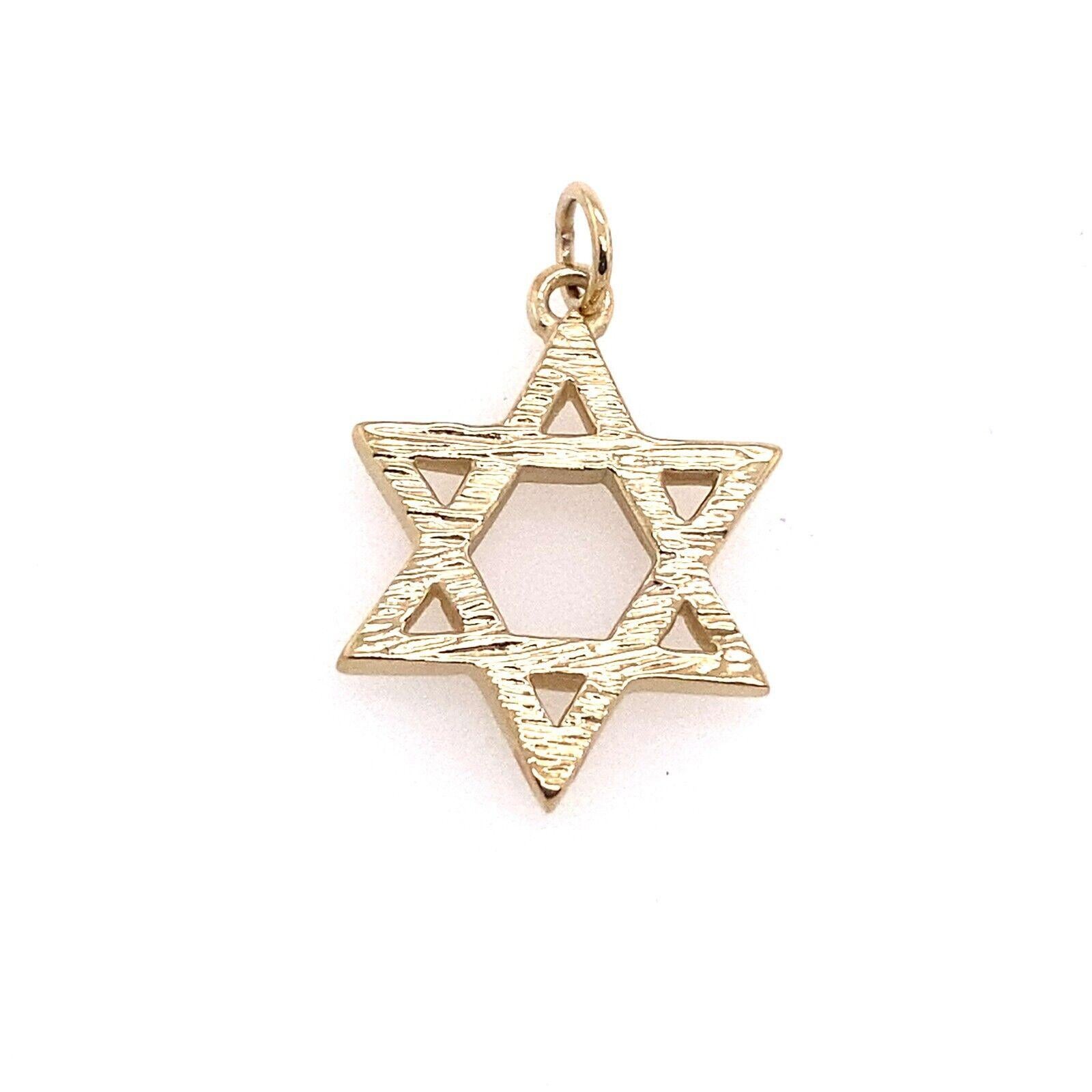 This 9ct Solid Yellow Gold Star of David pendant features a high shine finish on one side and a bark finish on the reverse side, with 9ct jump ring The pendant is 17.94mm in diameter and weighs 3.1g and is an ideal gift for any occasion.