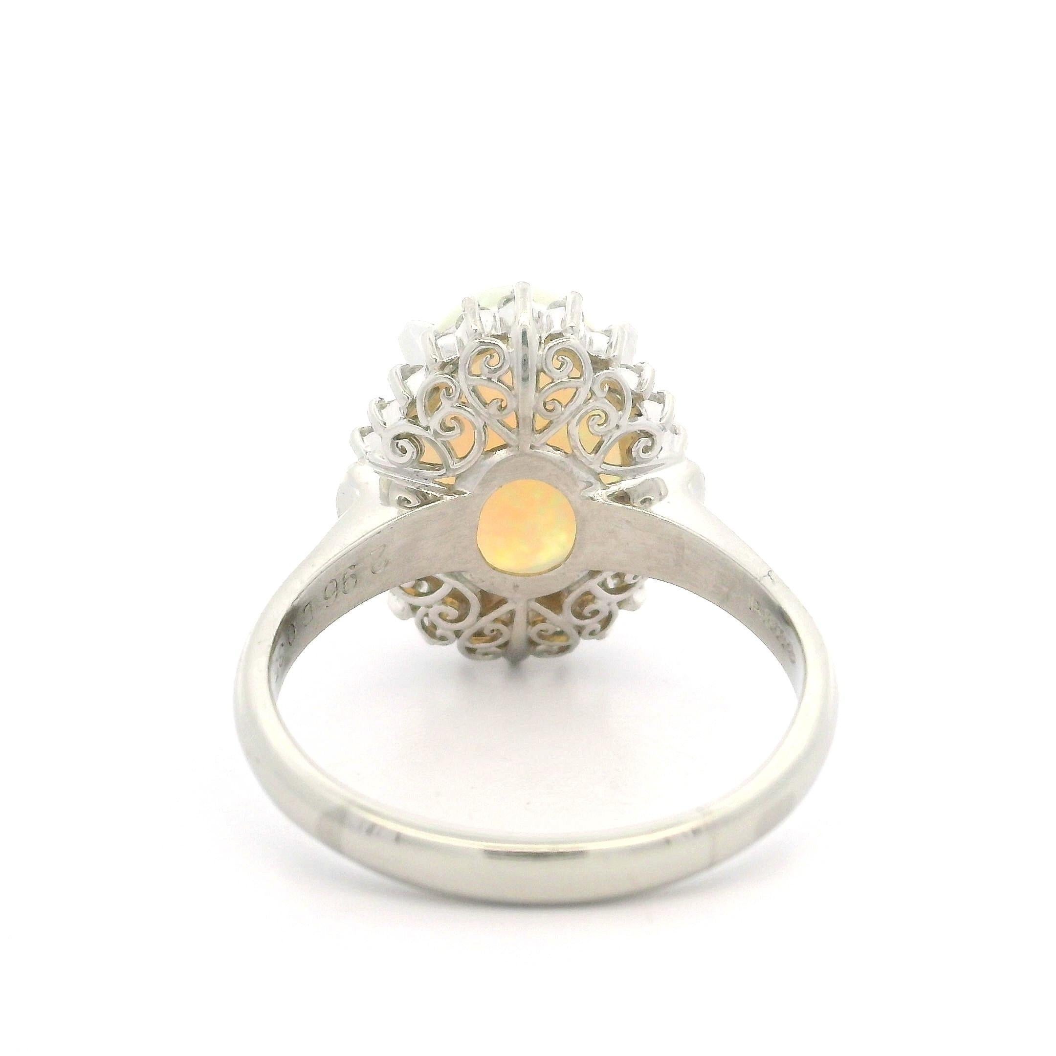 Classic Solid Platinum 3.31ctw Oval Cabochon Opal Diamond Halo Right Hand Ring For Sale 1