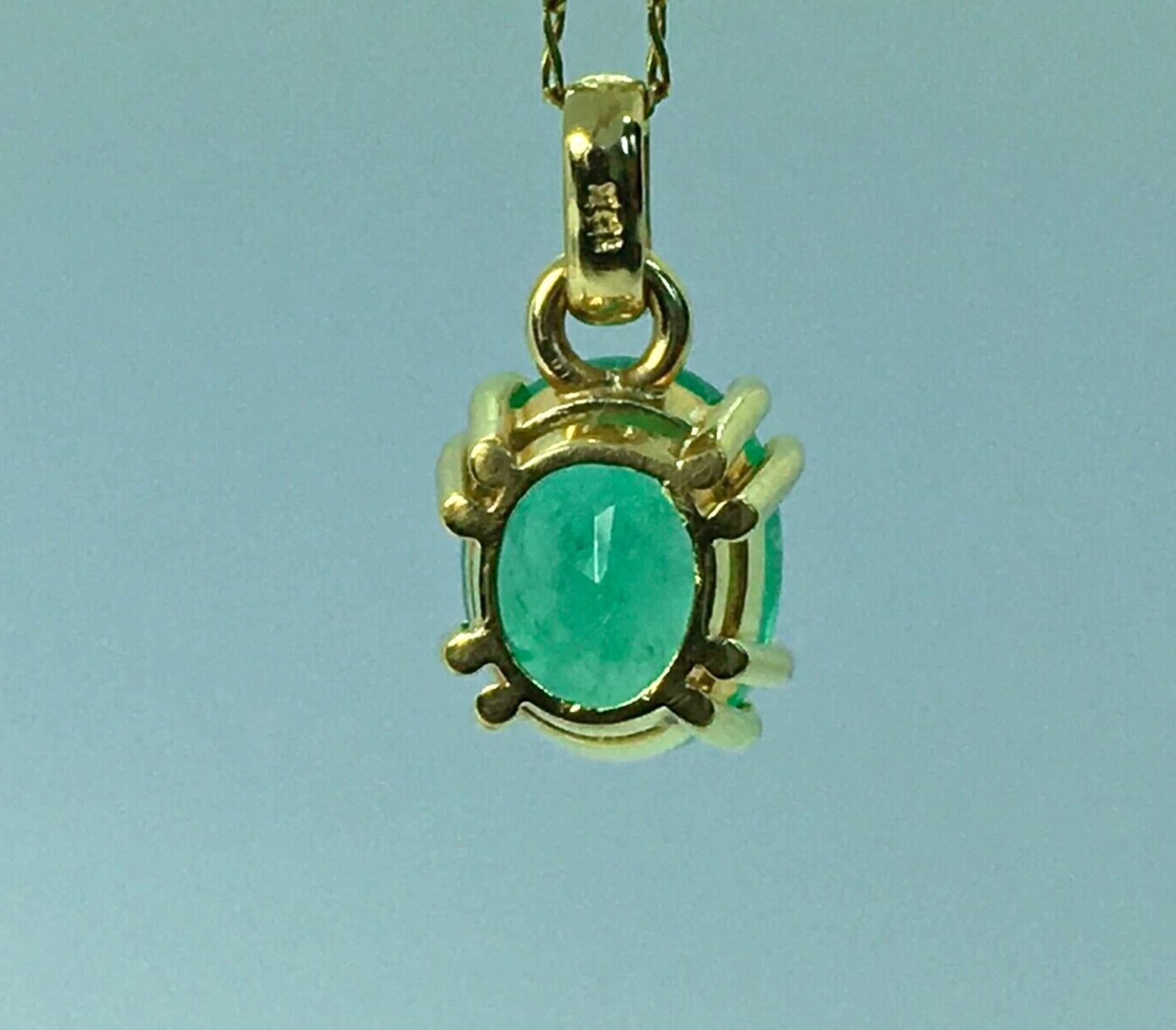 Classic Solitaire Oval Emerald Drop Pendant Necklace 18 Karat 1