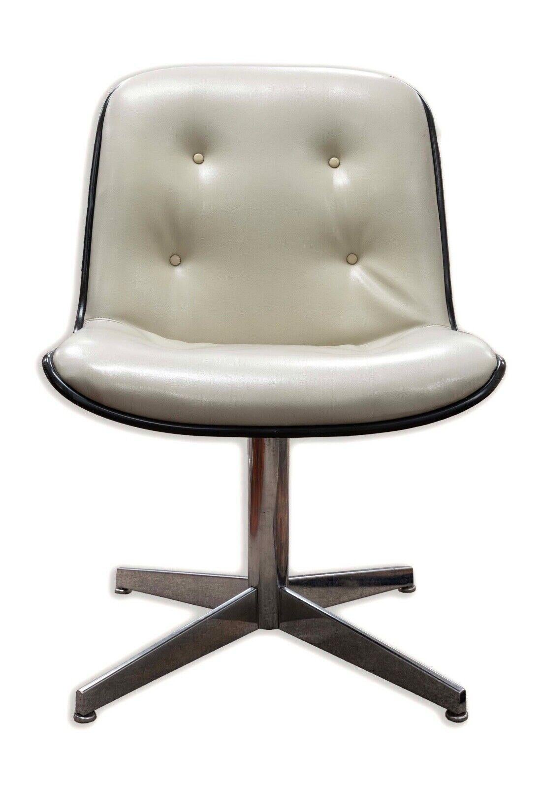 Classic Steelcase 1960s Office Sidechair in Dove Grey Mid Century Modern. This sleek office chair embodies the perfect blend of style and comfort, with its iconic mid-century modern design and dove grey upholstery. Featuring a sturdy chrome base and