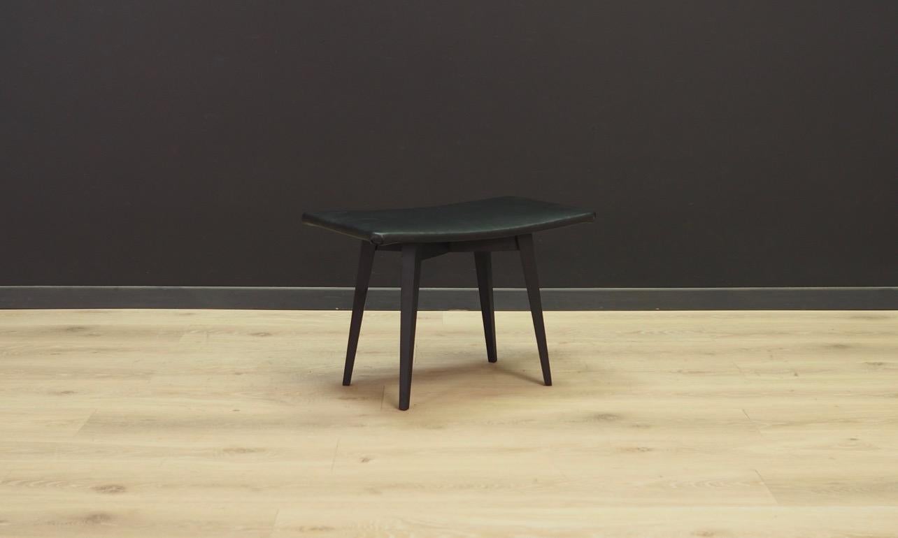 Classic stool of the 1960s-1970s. Danish design - perfect in every detail. Upholstery made of eco - leather in black. Preserved in good condition.

Dimensions: Height 37 cm width 53.5 cm depth 34 cm