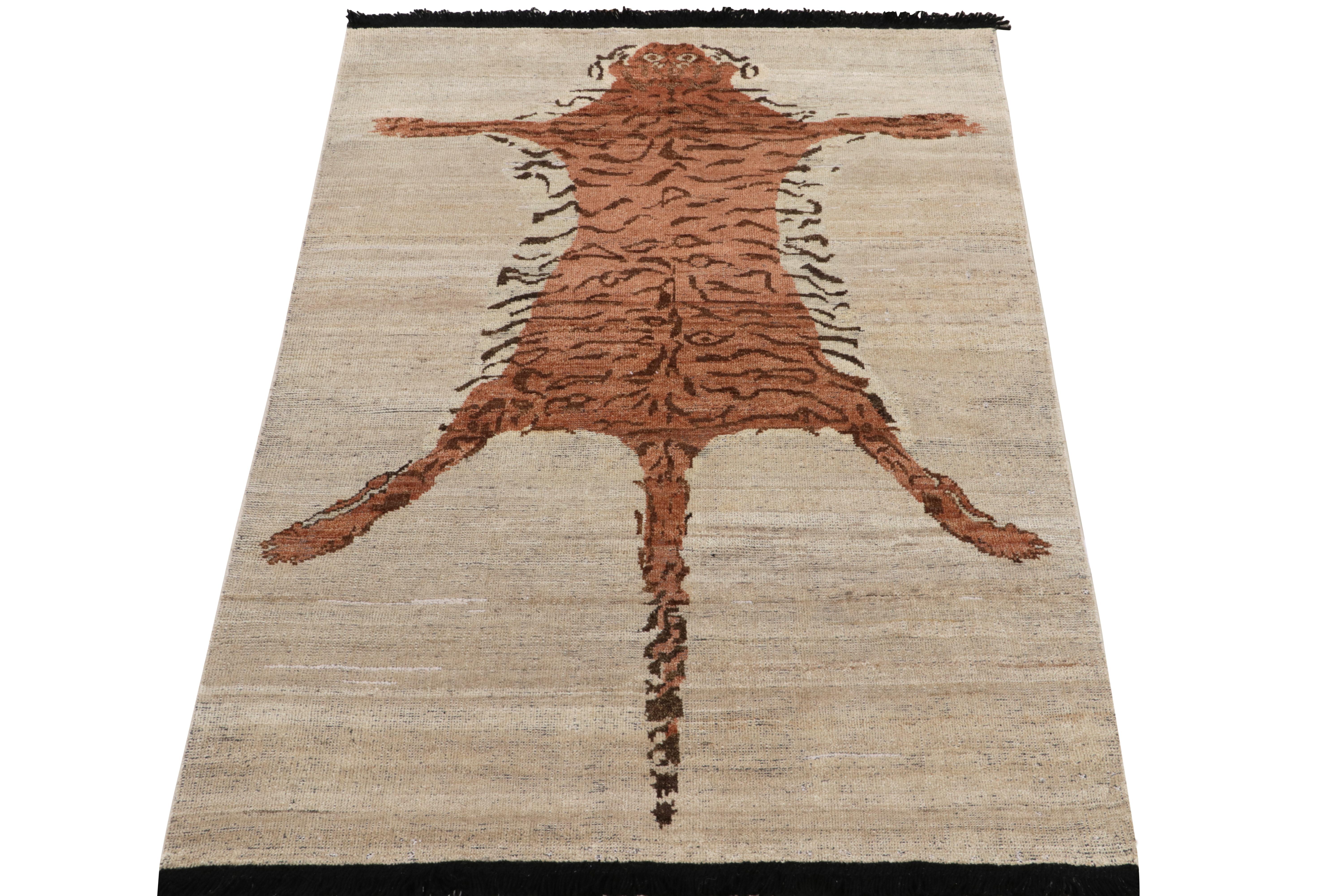 Hand-knotted in healthy wool pile, a 5x6 contemporary rug inspired by 20th century Indian tiger styles—joining our Burano Collection. The tiger pelt pictorial in tones of orange and brown rests comfortably on a beige negative space further