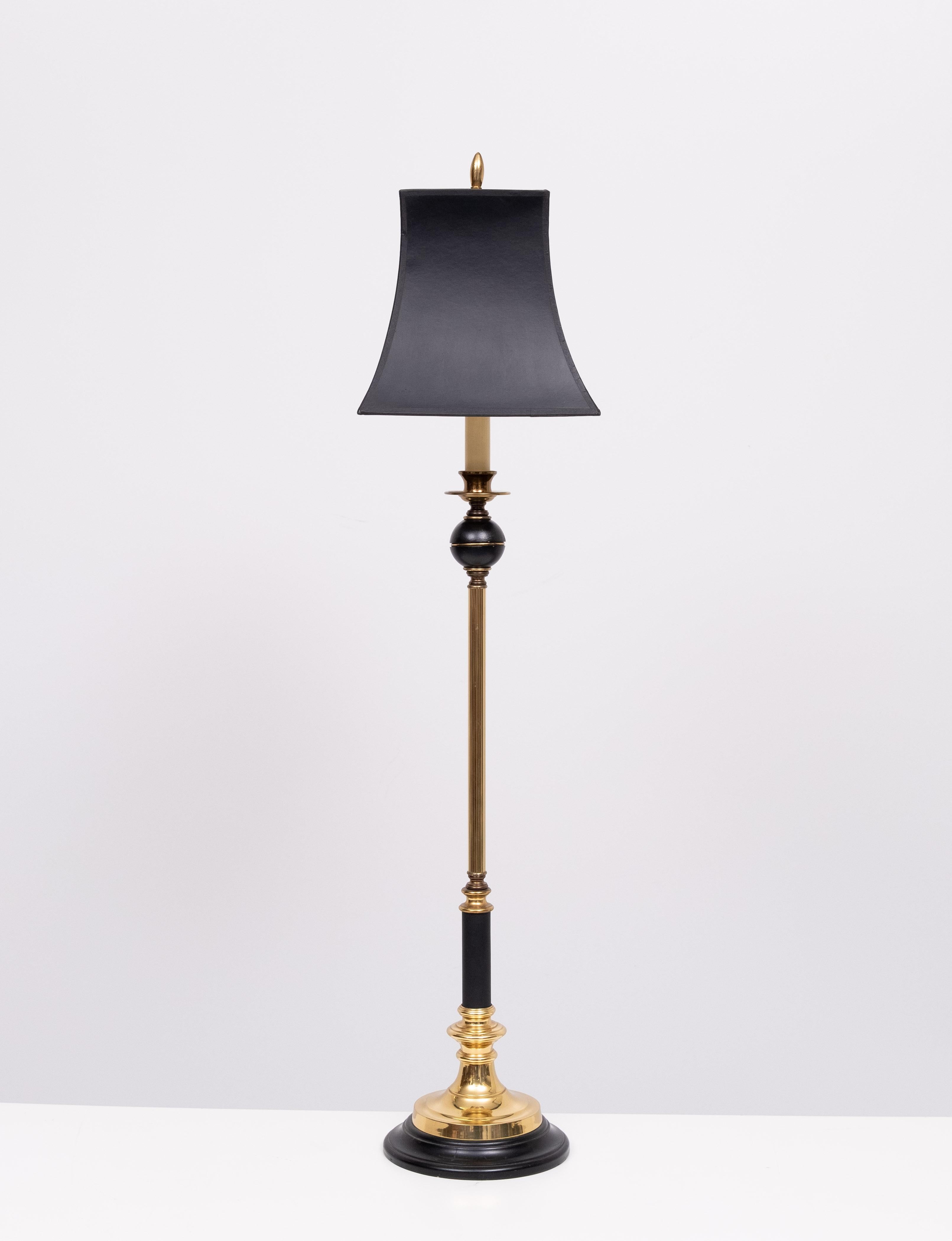 Very nice classic table lamp . High in size . comes with a Black 
shade . so stylish .  Maison Le Dauphin in style . 