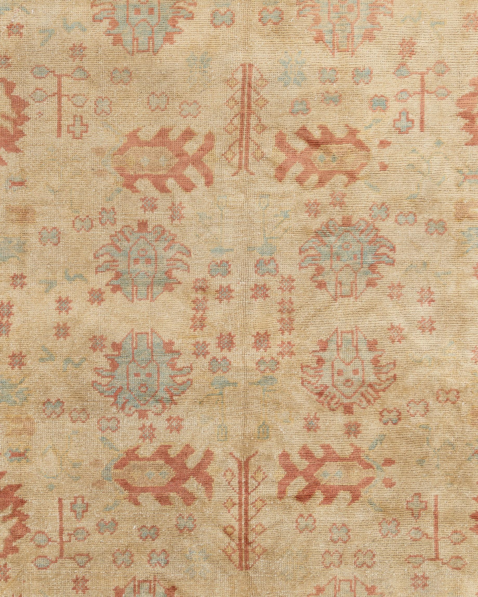 Classic Style Oushak rug. Measures: 13'6 x 16'9. Hand woven in Turkey using the finest of materials this is a classic recreation of an Oushak rug in soft colors.