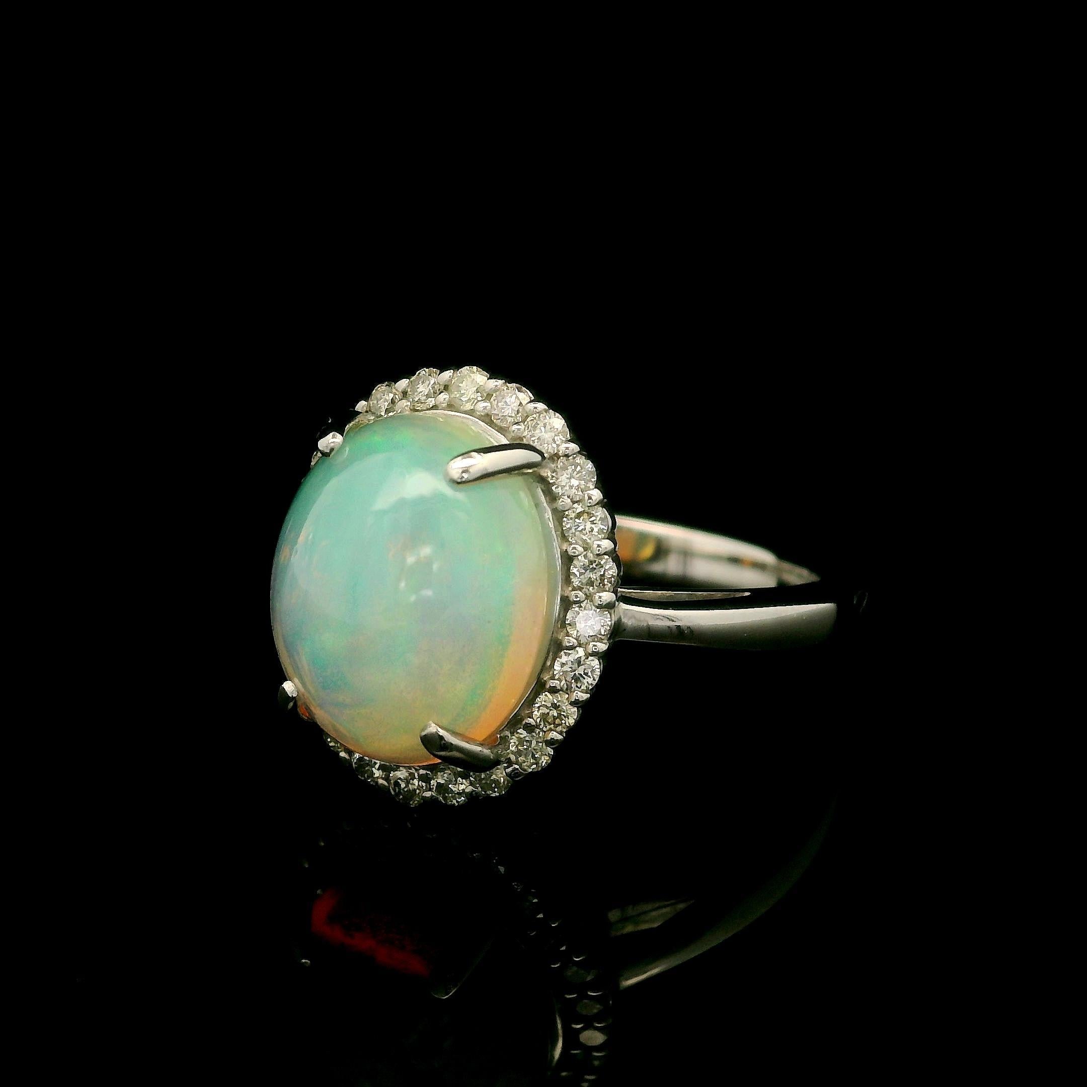 Anello in platino stile classico con opale ovale cabochon da 3,19 carati e diamante a raggiera in vendita 9